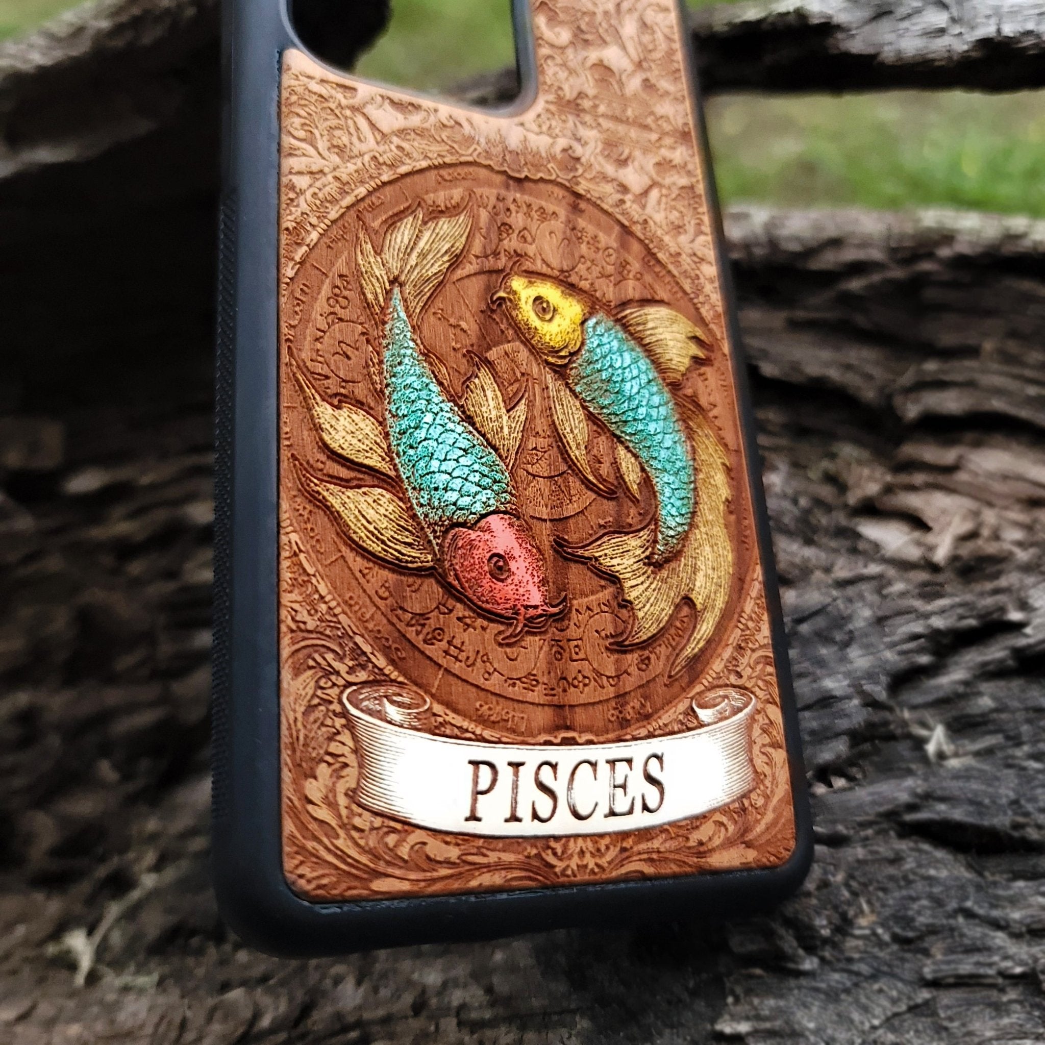 Engraved Pisces wood case with mystical zodiac fish illustration