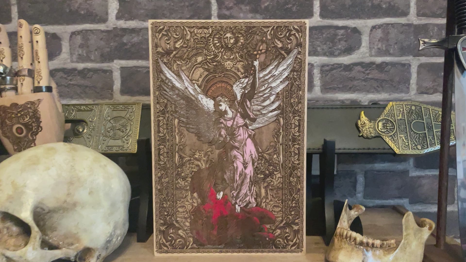 Detailed Saint Michael figure carved in wood, symbolic of divine protection.