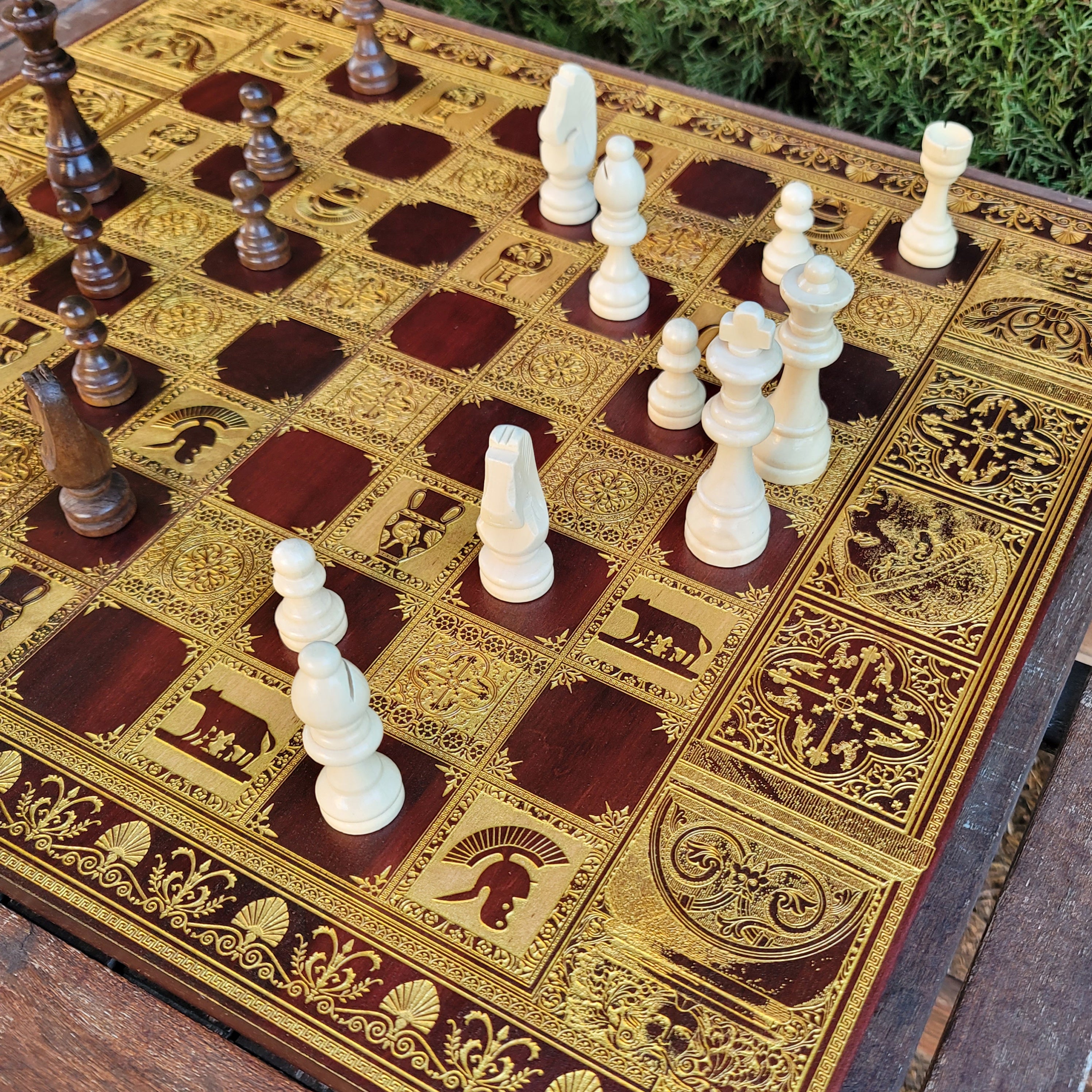 Detailed Close-Up of Roman-Themed Engraved Wooden Chessboard – Collectors Edition