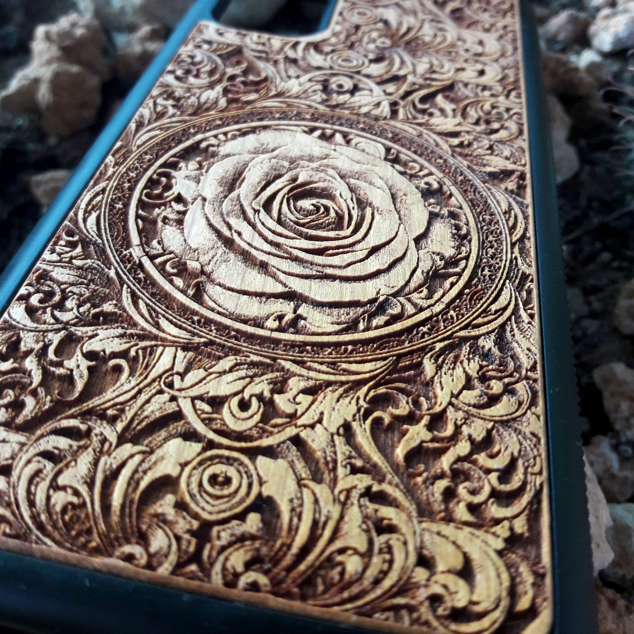 Wooden phone case with a gothic rose design, laser-engraved for iPhone , Galaxy S, and more. Perfect for lovers of gothic art and vintage style, offering durable protection and a unique, handcrafted aesthetic.