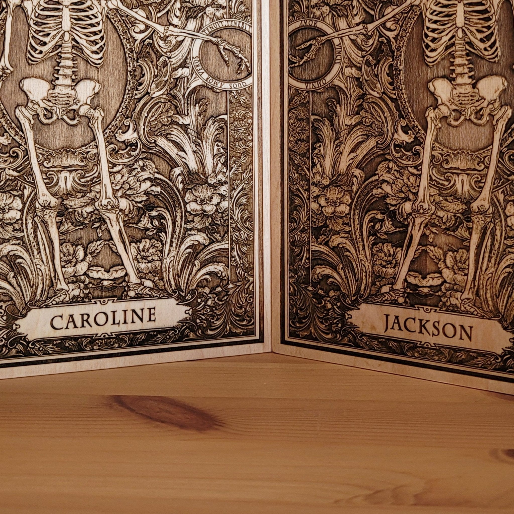 Halloween-inspired gothic wall art with engraved skeleton couple design.