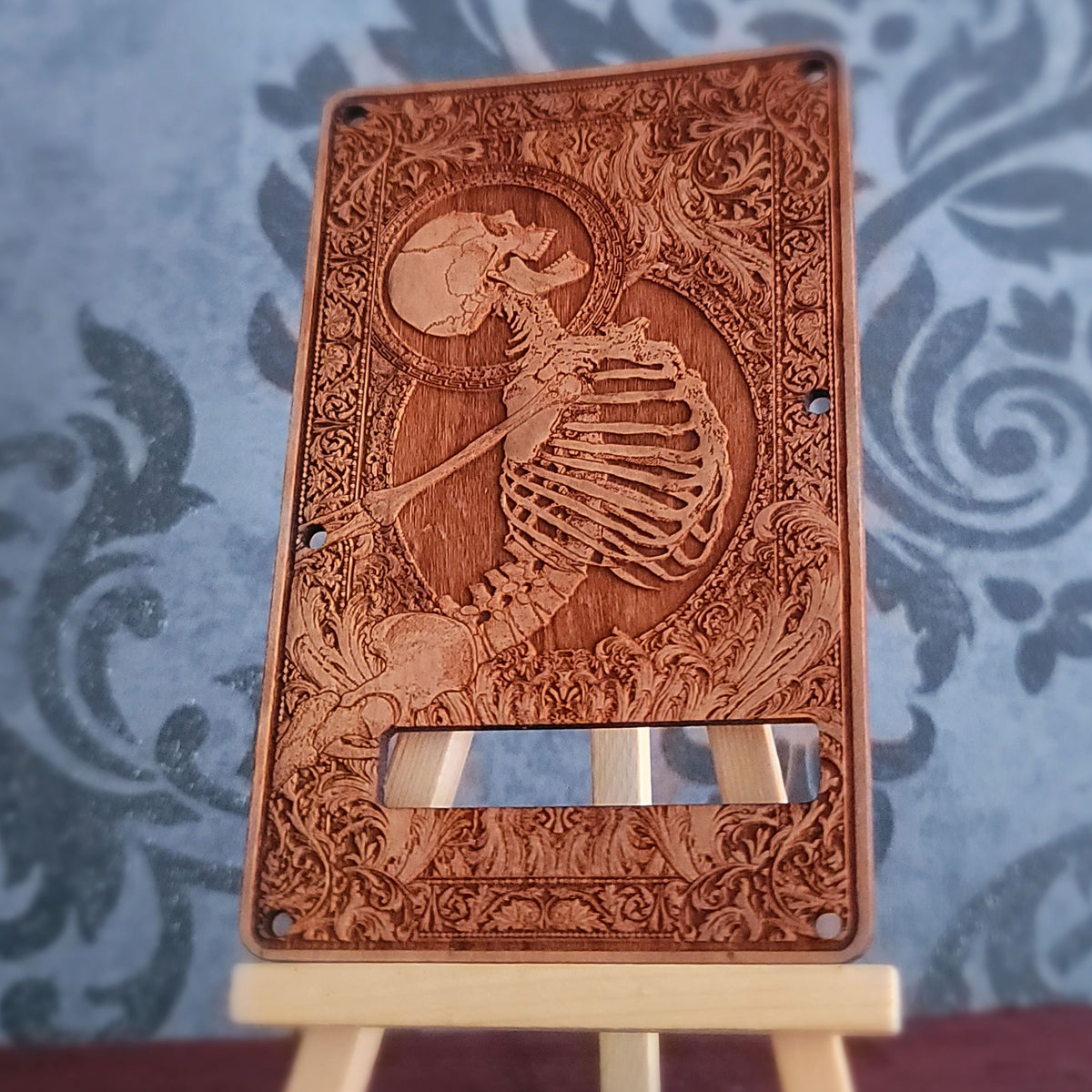 Wooden guitar backplate with detailed human skeleton laser engraving