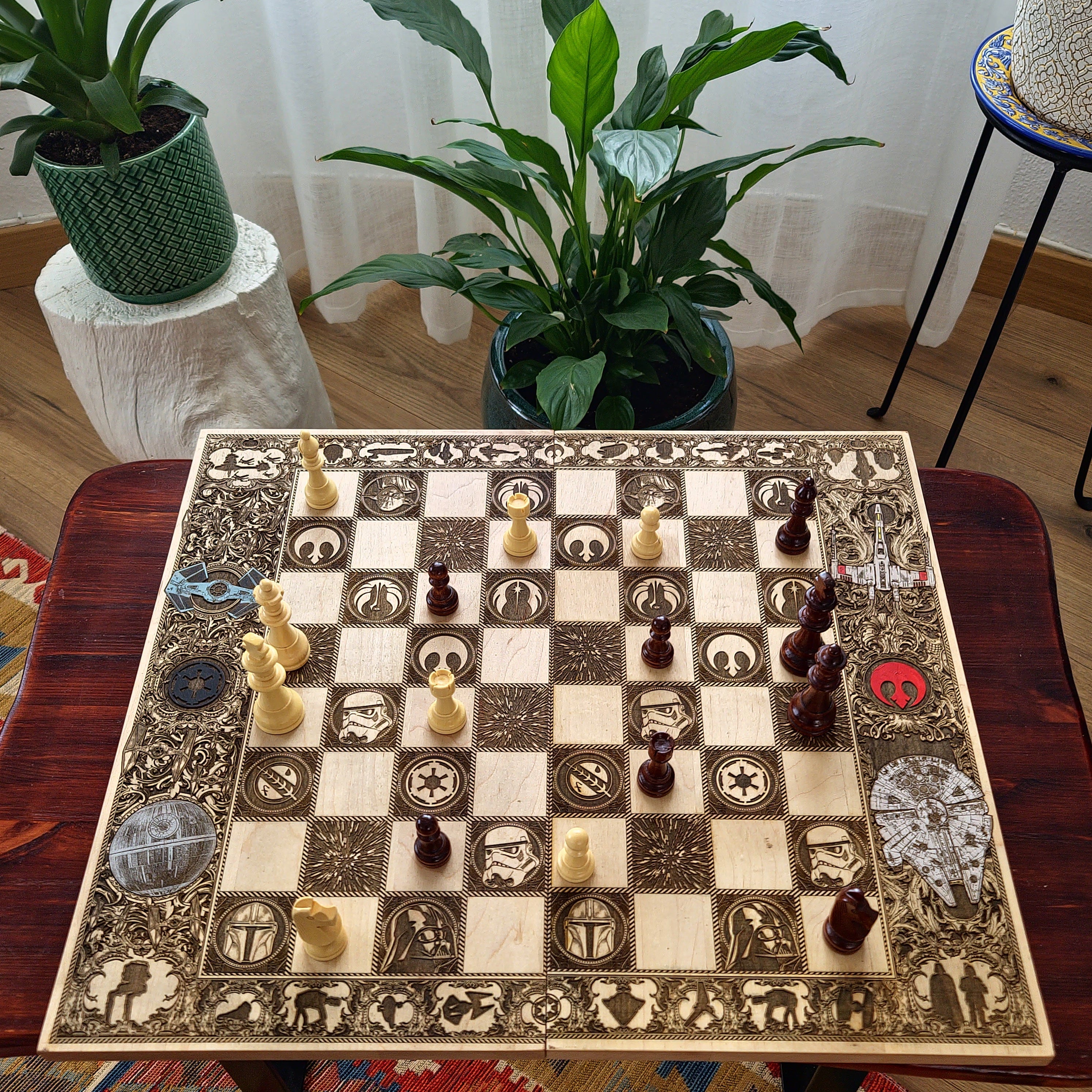Handcrafted sci-fi space battle chessboard, tournament size, made from solid maple wood with laser-engraved starships and symbolic engravings of intergalactic war. A luxury gift for chess lovers & space battle fans.