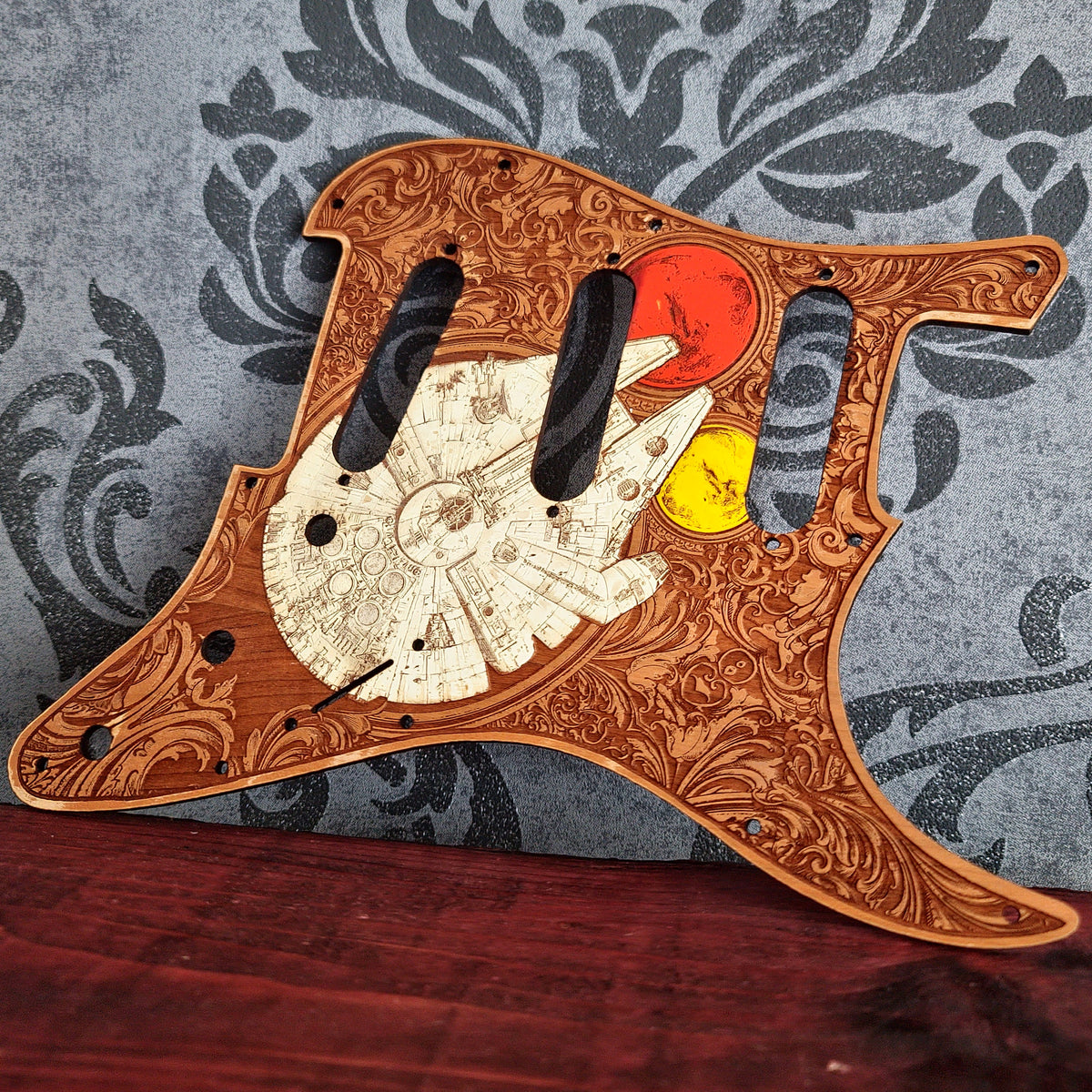 Custom Stratocaster wood pickguard with laser engraving and hand painted details