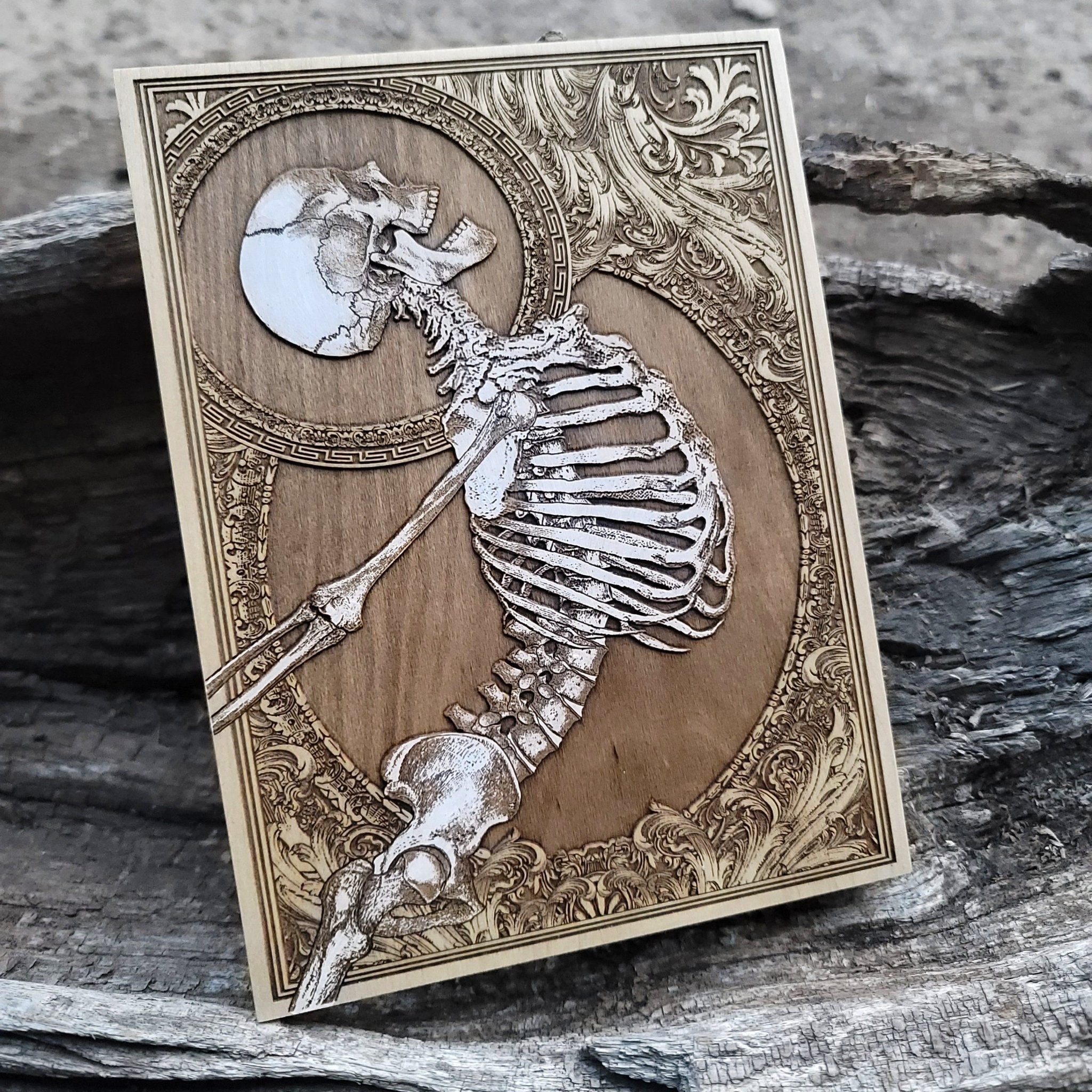 Unique horror-inspired skull wood art, gothic skeleton decor piece.