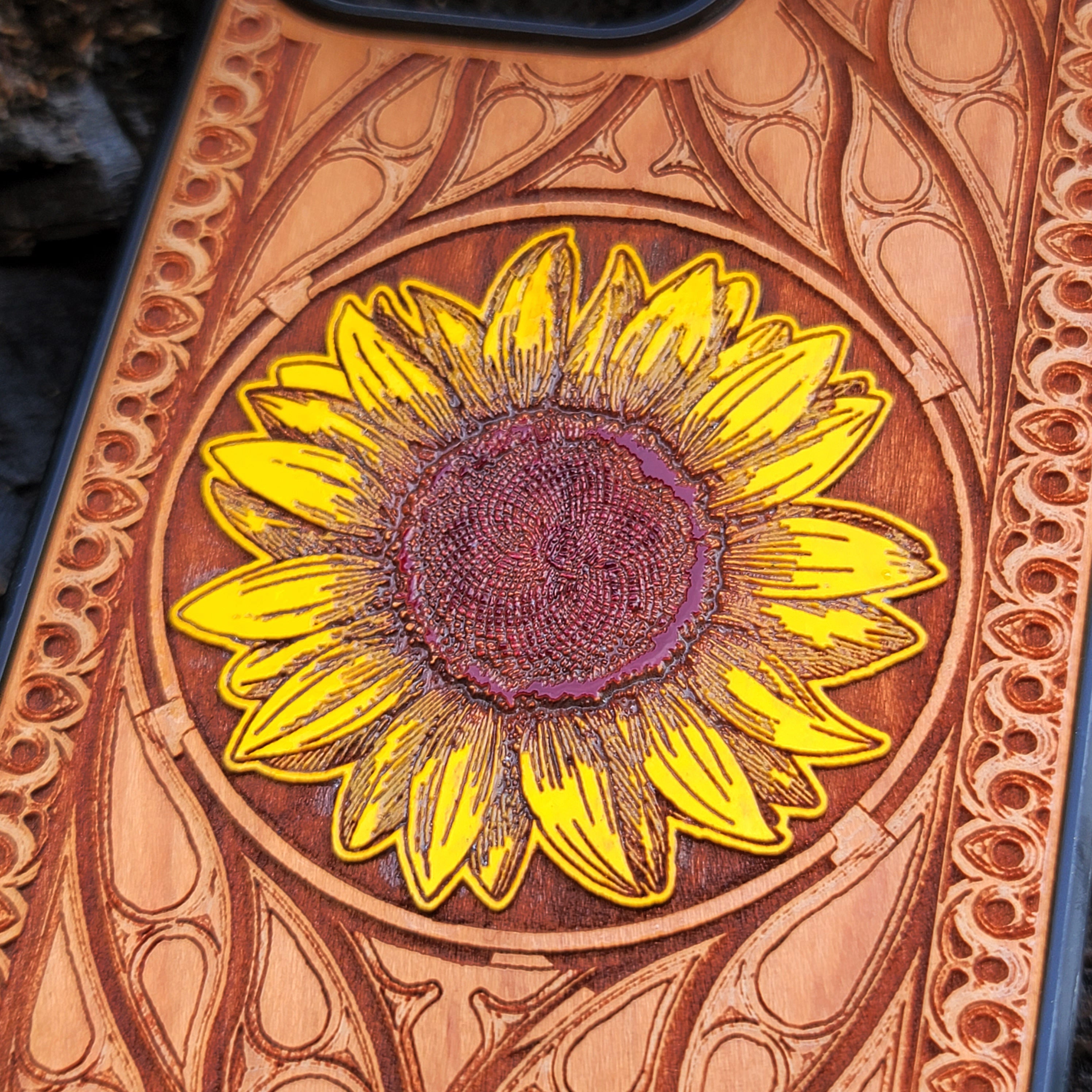 Laser-engraved sunflower design on a wooden phone case, compatible with iPhone and Samsung Galaxy  eco-friendly, slim, and stylish.