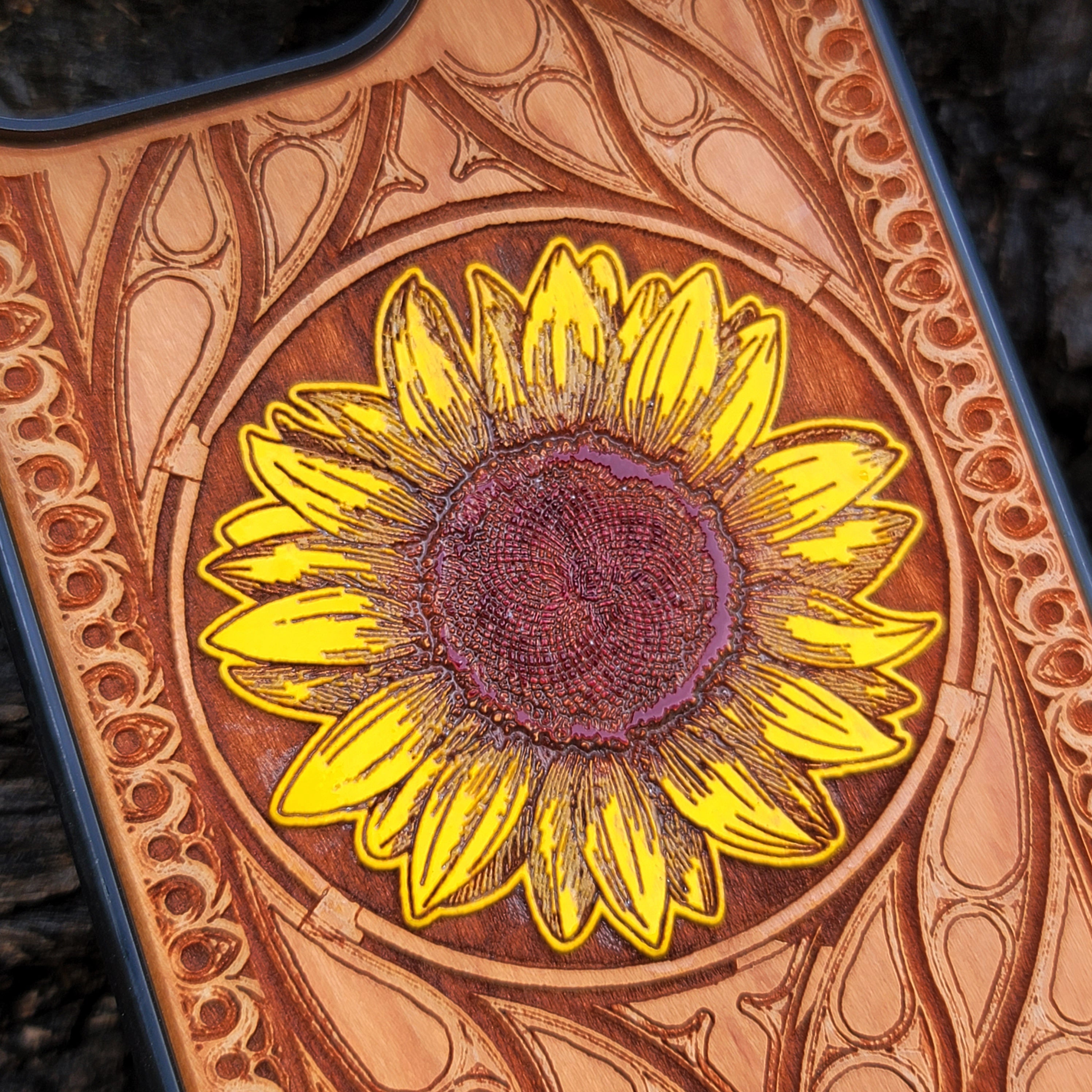 Laser-engraved sunflower design on a wooden phone case, compatible with iPhone and Samsung Galaxy  eco-friendly, slim, and stylish.