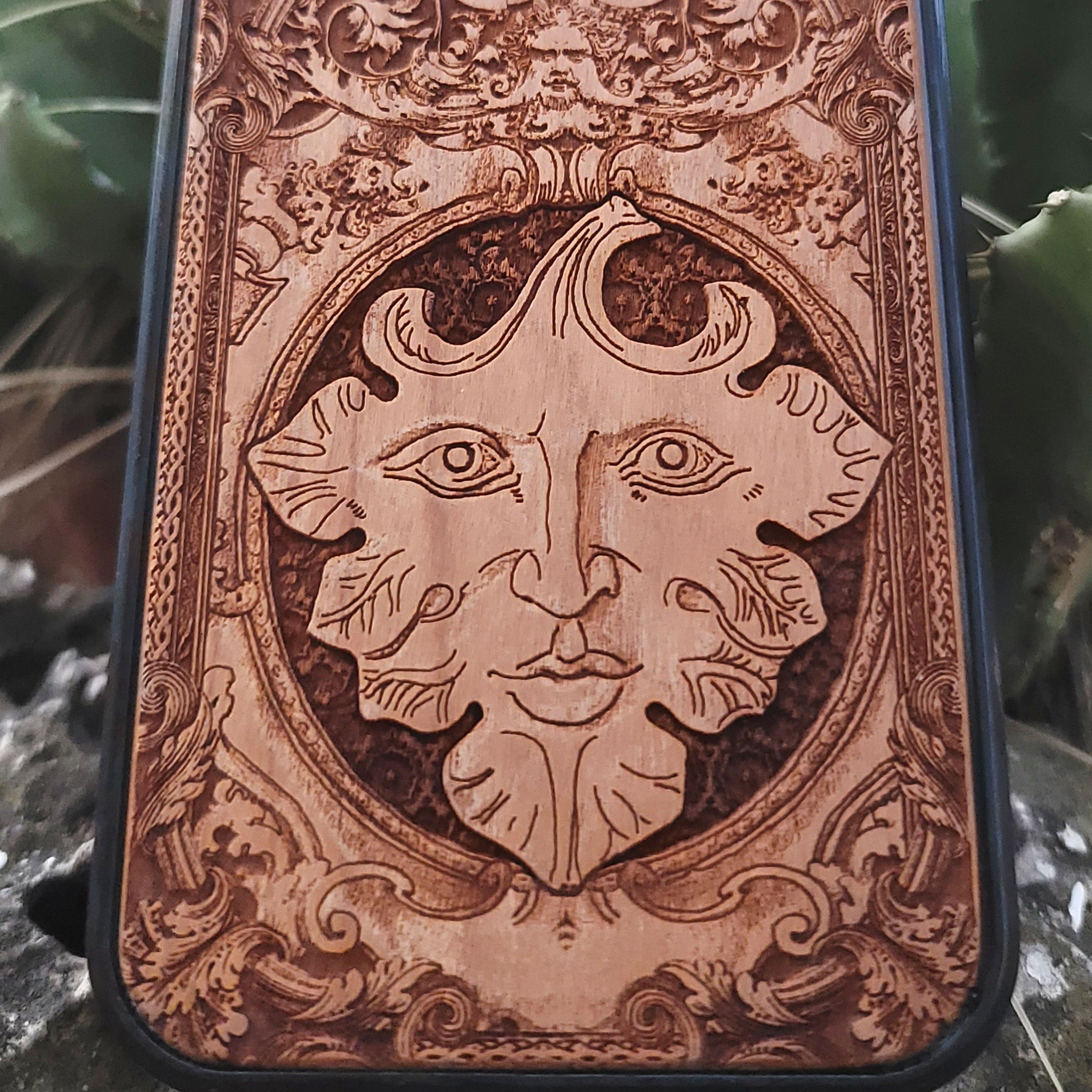 The Green Man wood phone case with engraved pagan folklore design for iPhone 16, iPhone 15, iPhone 14, Galaxy S25, Galaxy S24