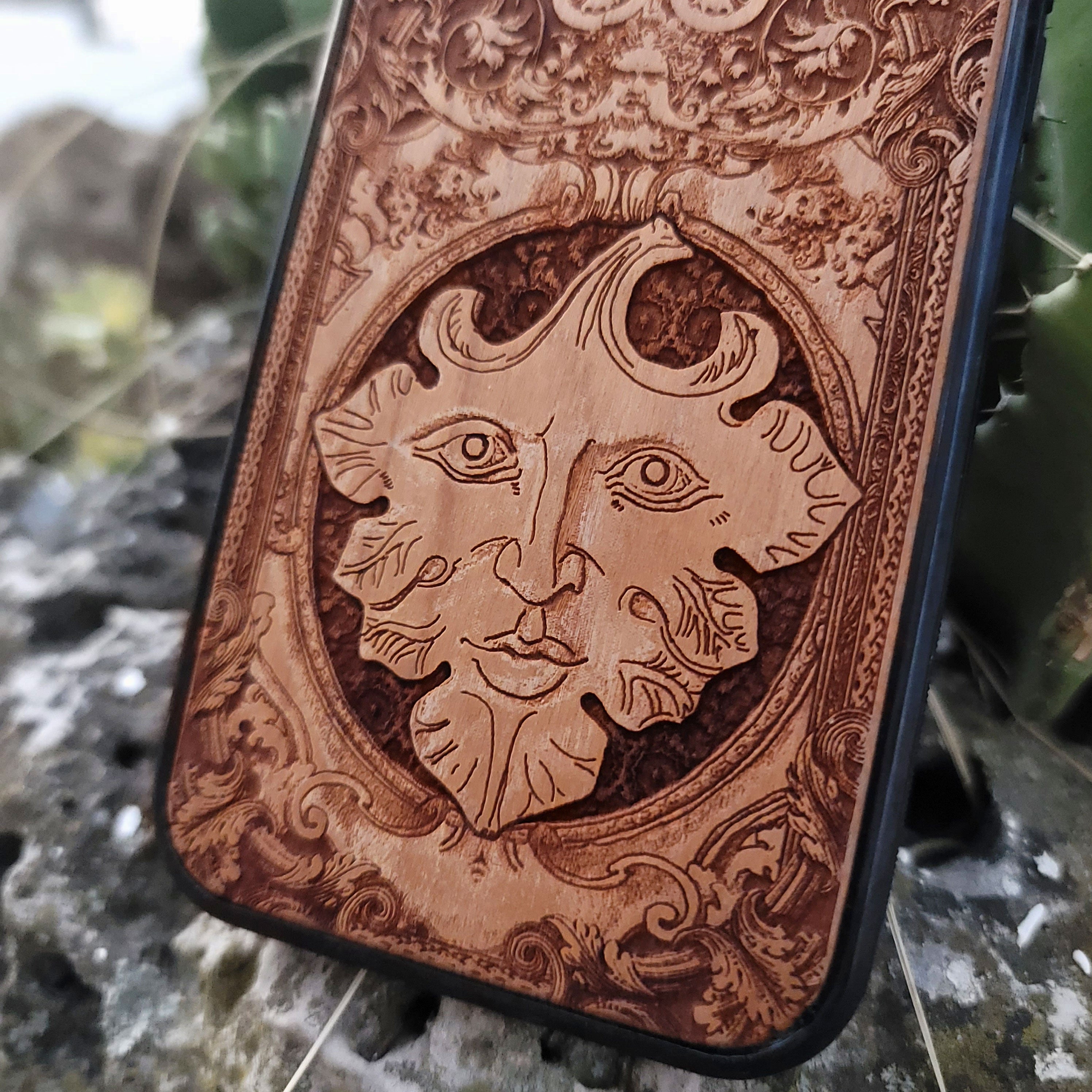 The Green Man wood phone case with engraved pagan folklore design for iPhone 16, iPhone 15, iPhone 14, Galaxy S25, Galaxy S24