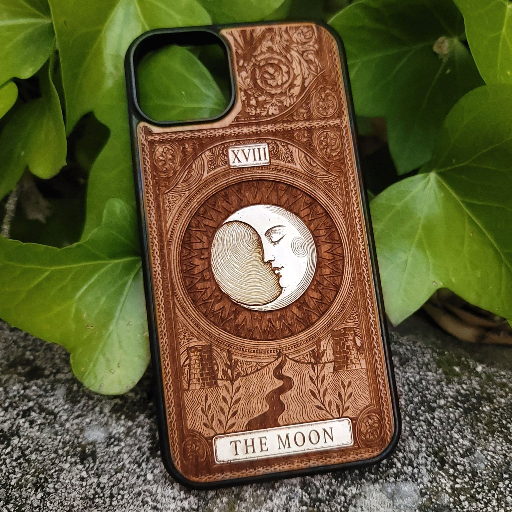 Handmade wooden phone case featuring The Moon tarot card design, laser engraved and hand-painted. Fits iPhone , 15, 14, 13, 12 Pro Max and Samsung Galaxy S, S24, S23, S22 Ultra and Plus models.