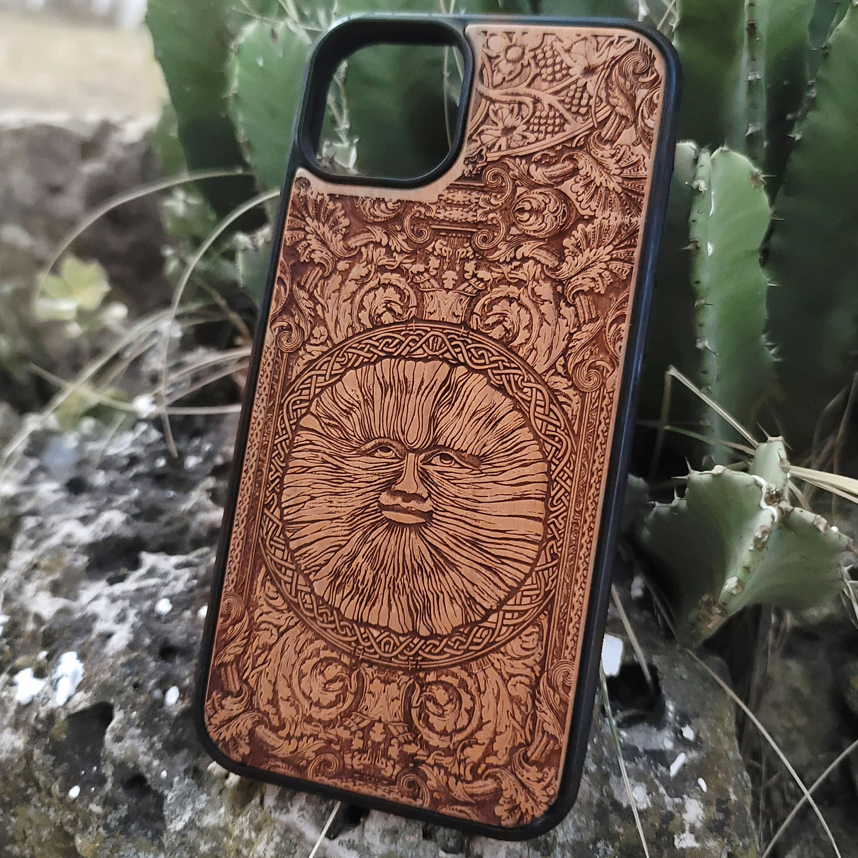 Engraved wood phone case with Wicker Man pagan sun symbol design for iPhone 16–11 and Samsung Galaxy S25–S20