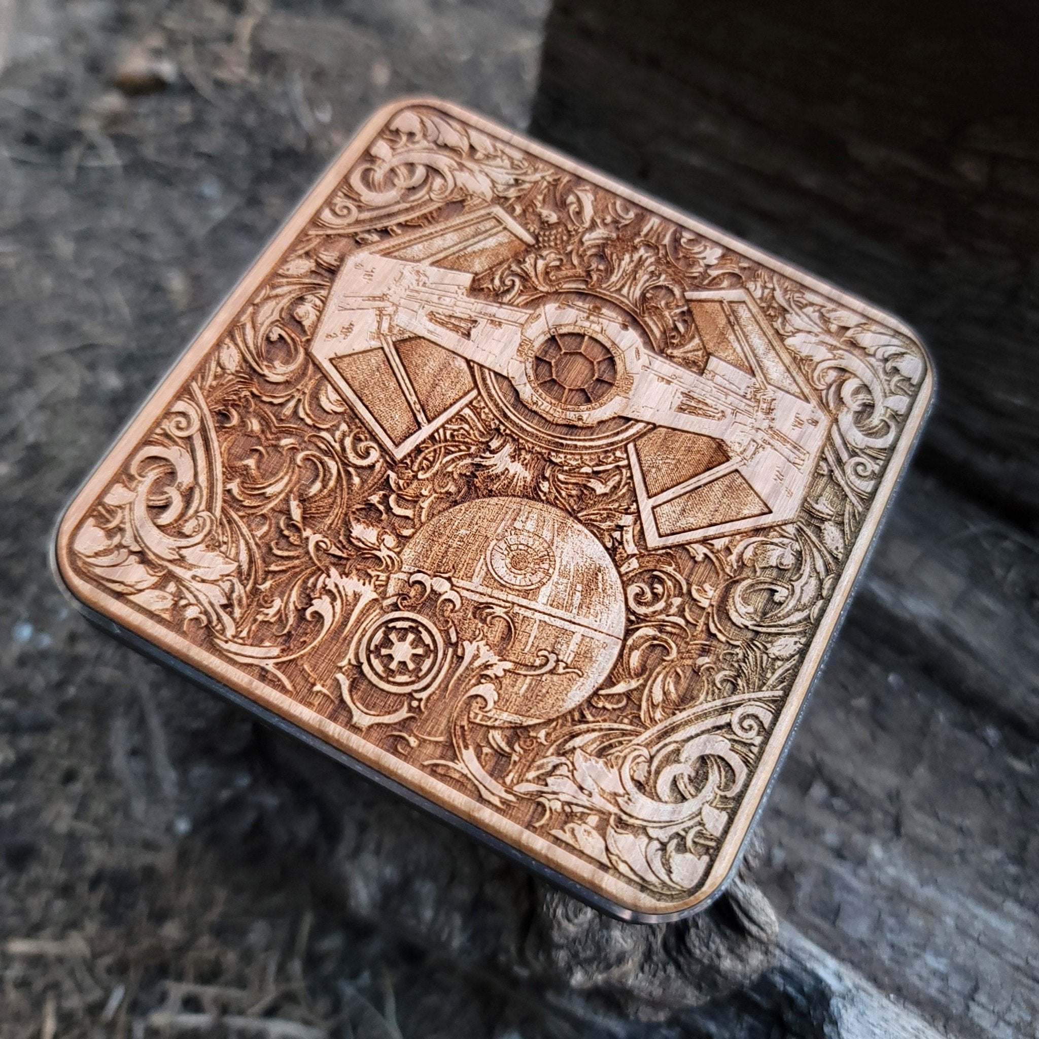 Top-down angle of sci-fi ships engraved on galaxy-themed charger.
