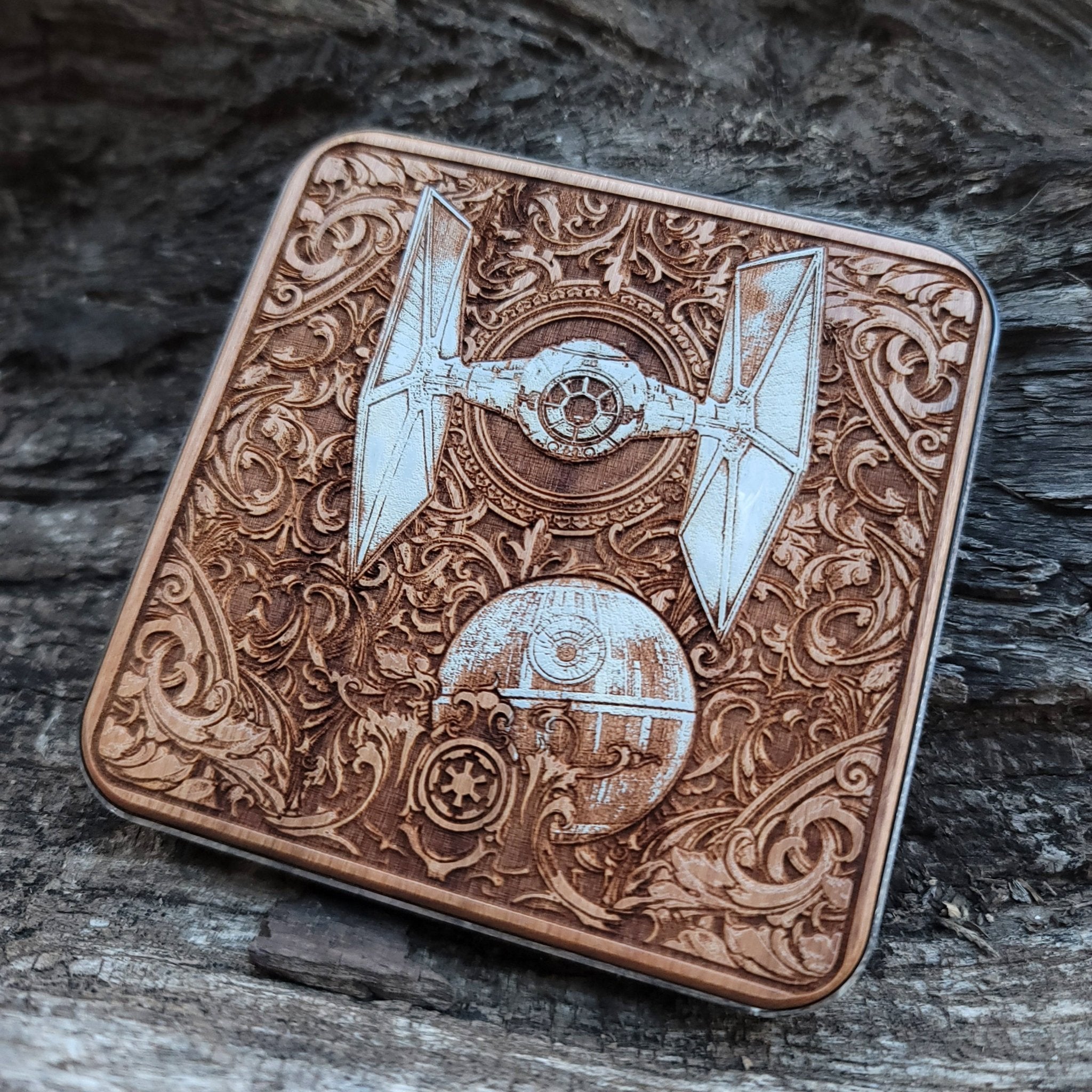 Side angle showing hand-painted galaxy fleet on dark wood charger.