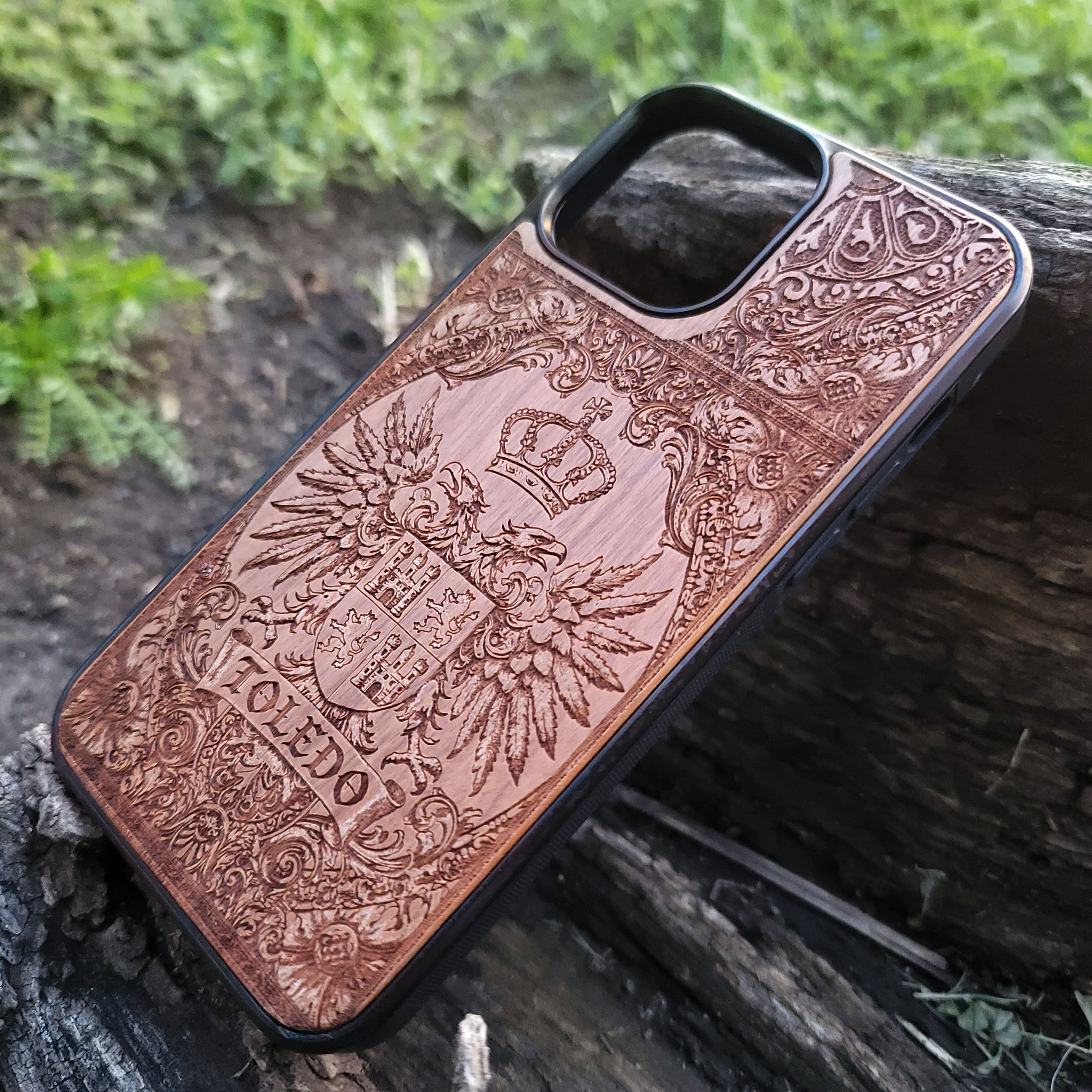 Custom wood phone case for iPhone and Galaxy with Toledo crest design.