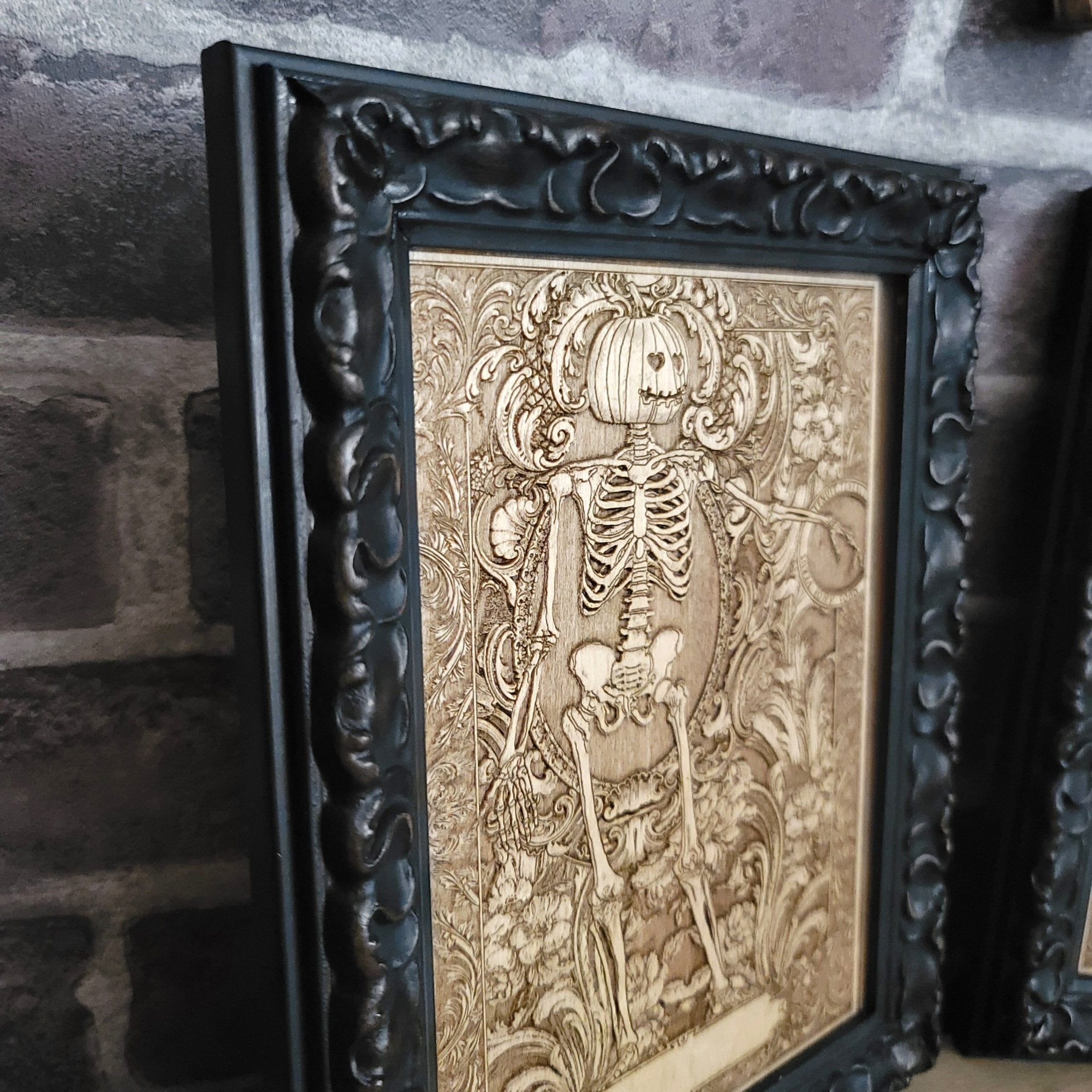 Dark romantic skeleton couple artwork, handcrafted Halloween decor.