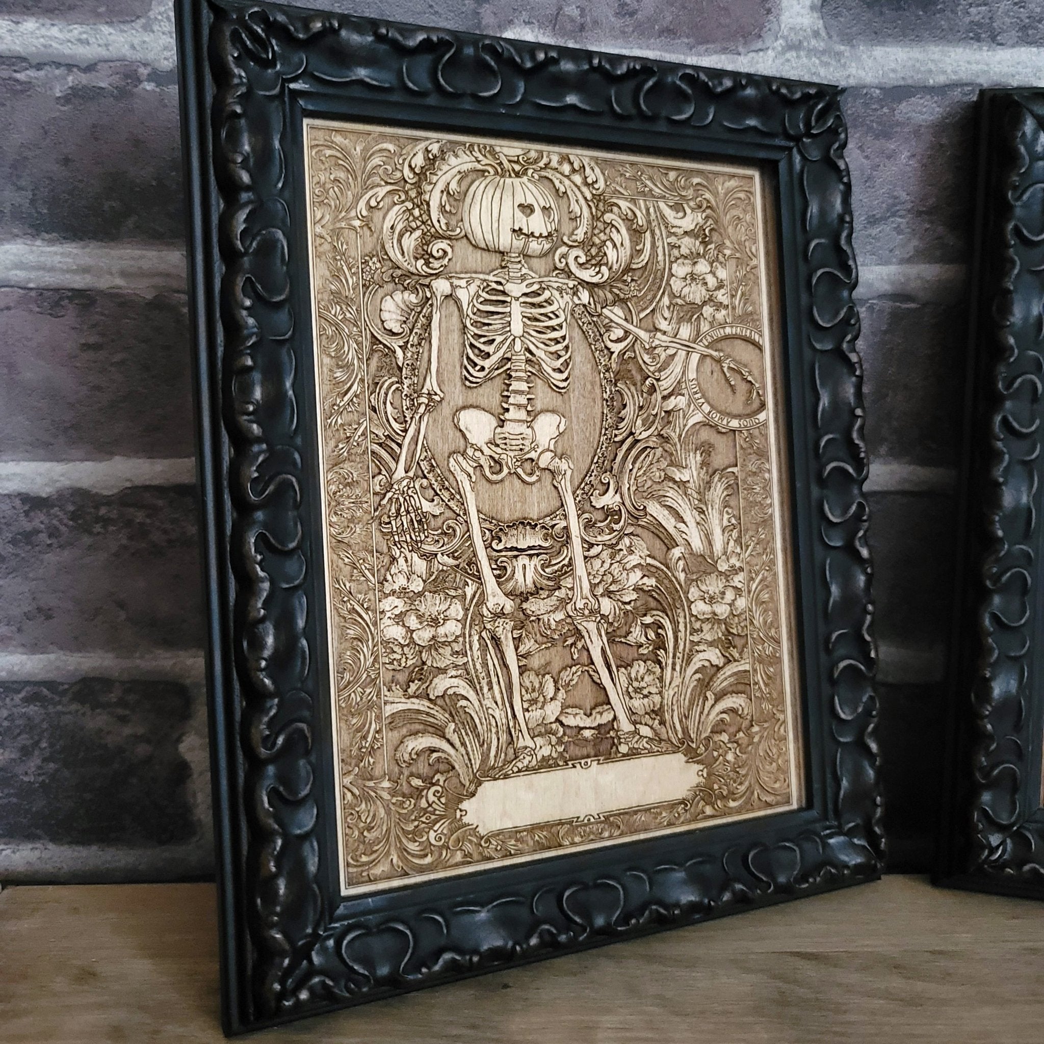Engraved wood Halloween art featuring skeleton lovers holding hands.