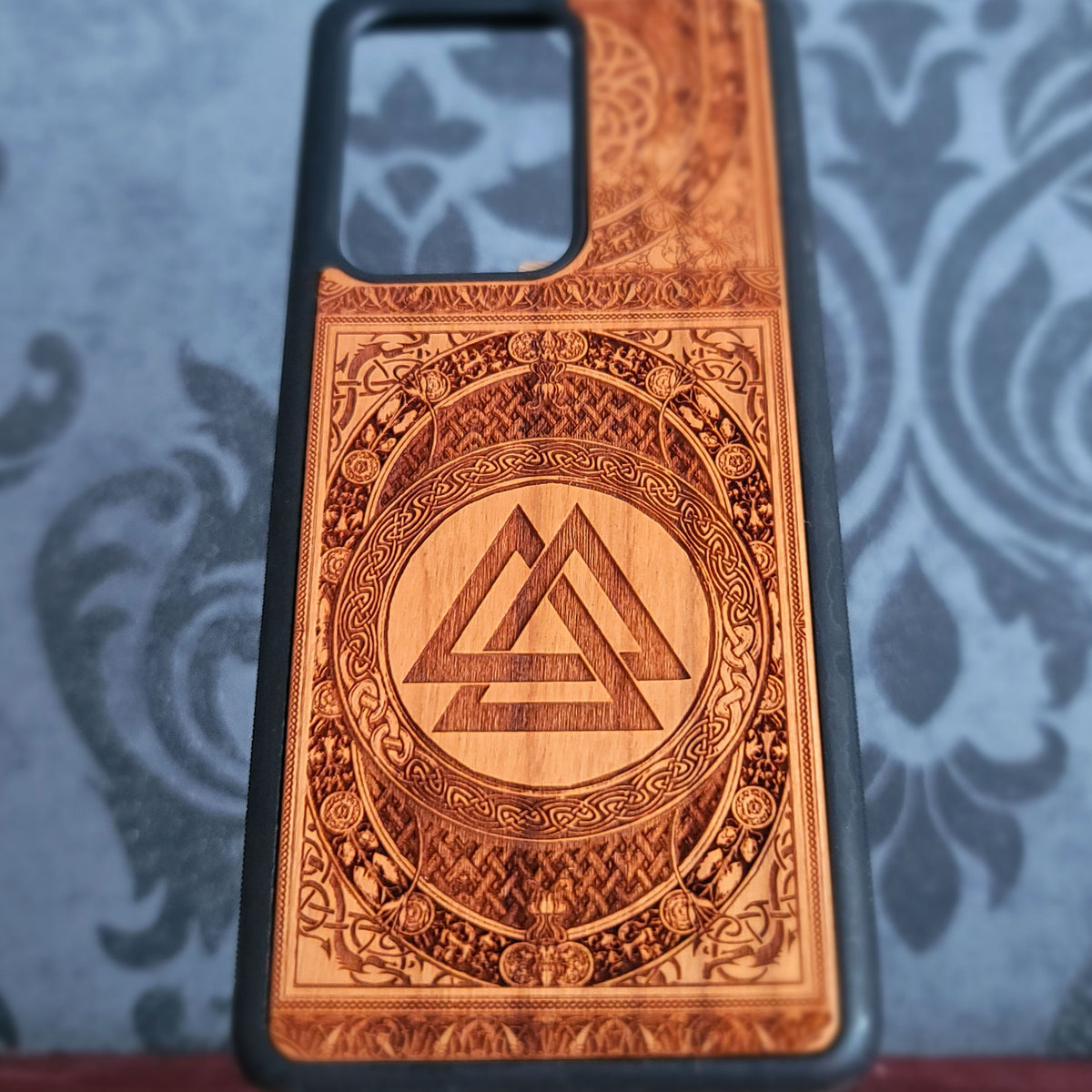 Norse Valknut wood phone case with detailed Nordic knotwork engraving
