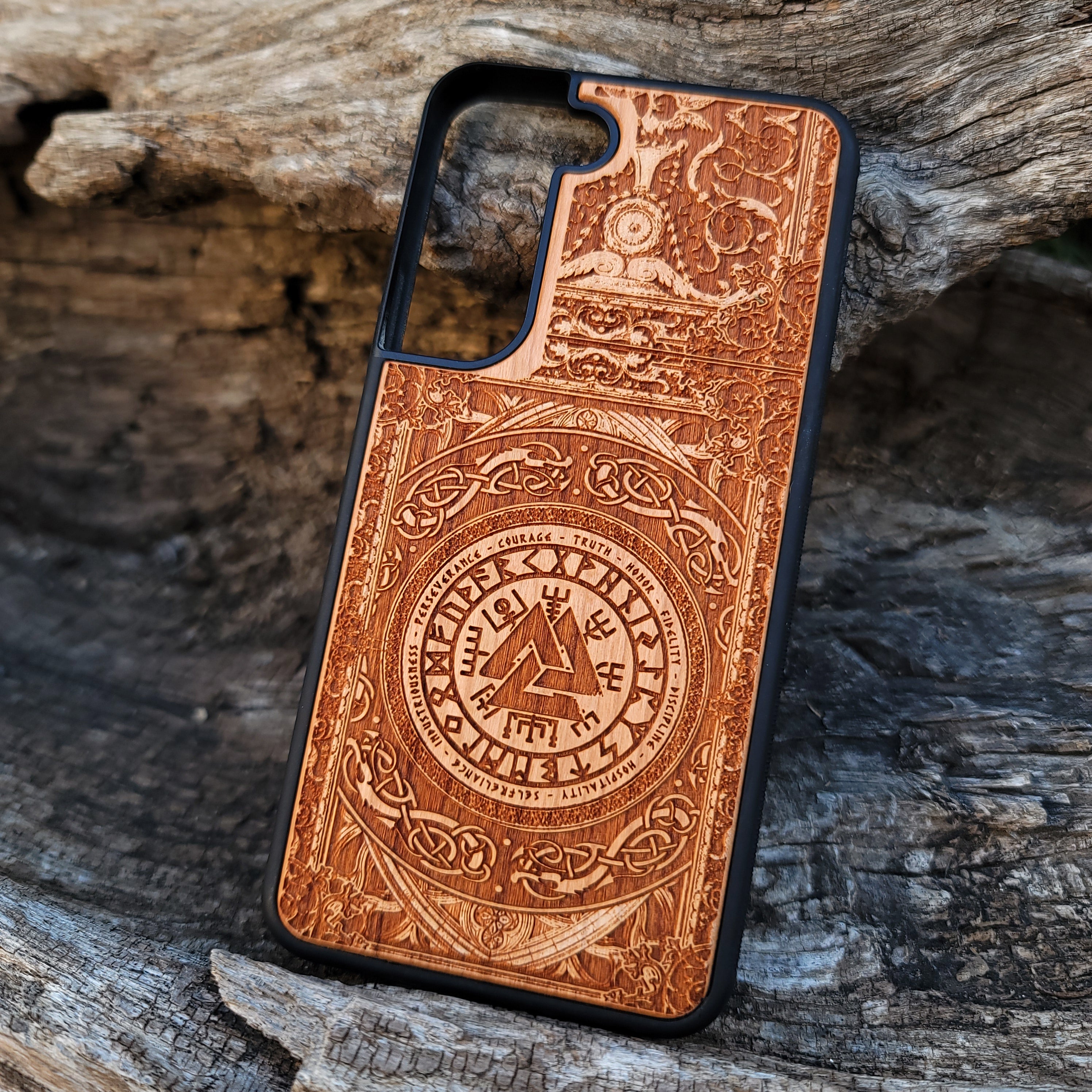 Viking Helmet wood phone case featuring a laser-engraved Norse warrior helmet design with intricate detailing. Compatible with iPhone , 15, 14, 13, 12, 11 Pro Max Mini, and Samsung Galaxy S, S24, S23, S22, S21, S20 Ultra, Plus, Note 20. Durable, slim, and protective, perfect for fans of Viking mythology and Norse culture.