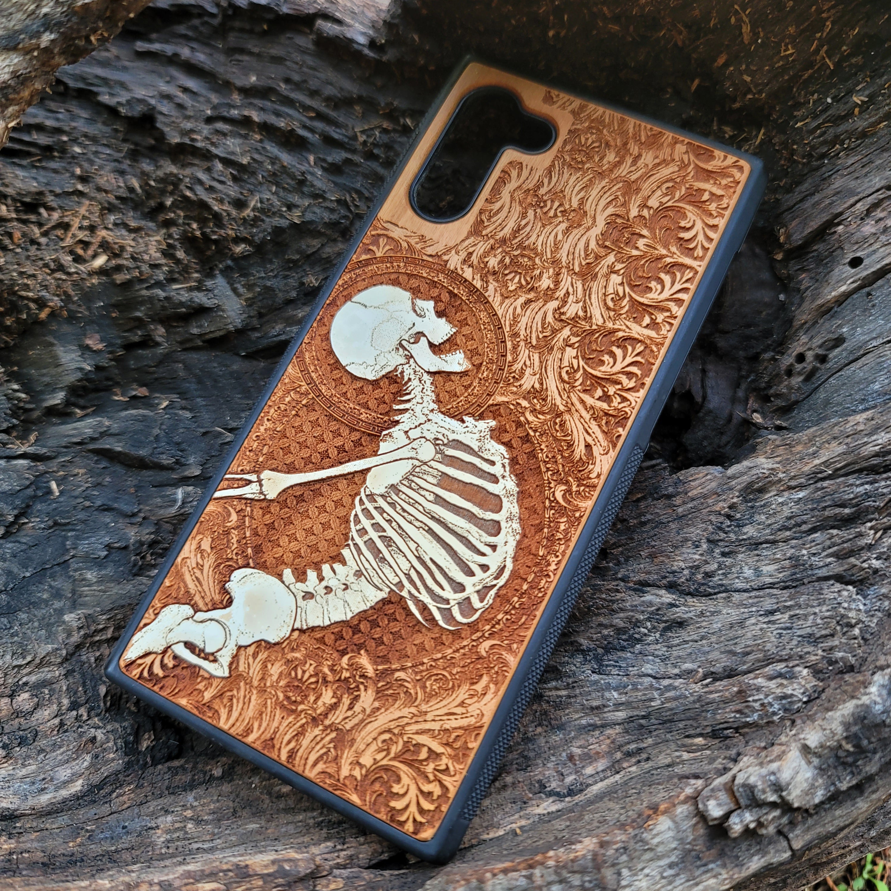 Gothic skeleton warrior artwork engraved on a wooden phone case, compatible with iPhone  and Samsung Galaxy S.