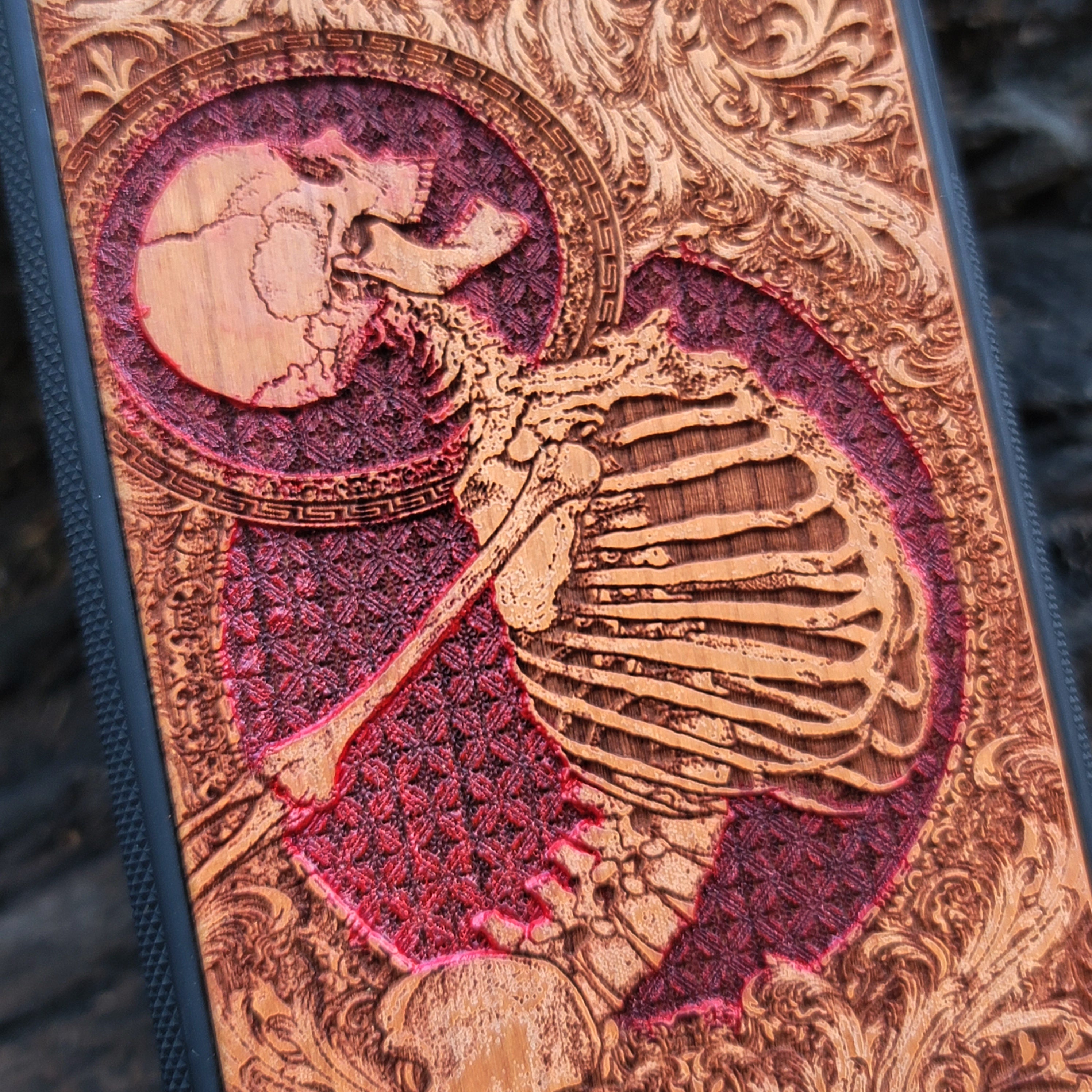Hand-painted cherry wood phone case with Gothic skeleton engraving, designed for iPhone & Samsung Galaxy models.