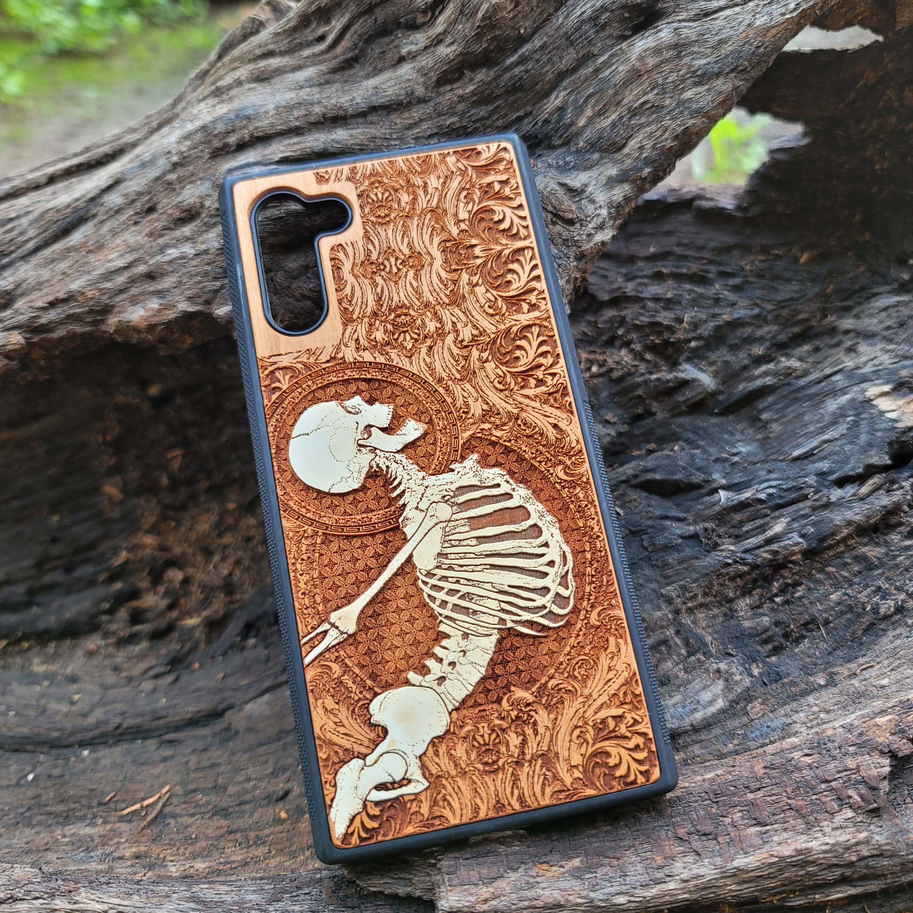 Gothic skeleton warrior artwork engraved on a wooden phone case, compatible with iPhone  and Samsung Galaxy S.