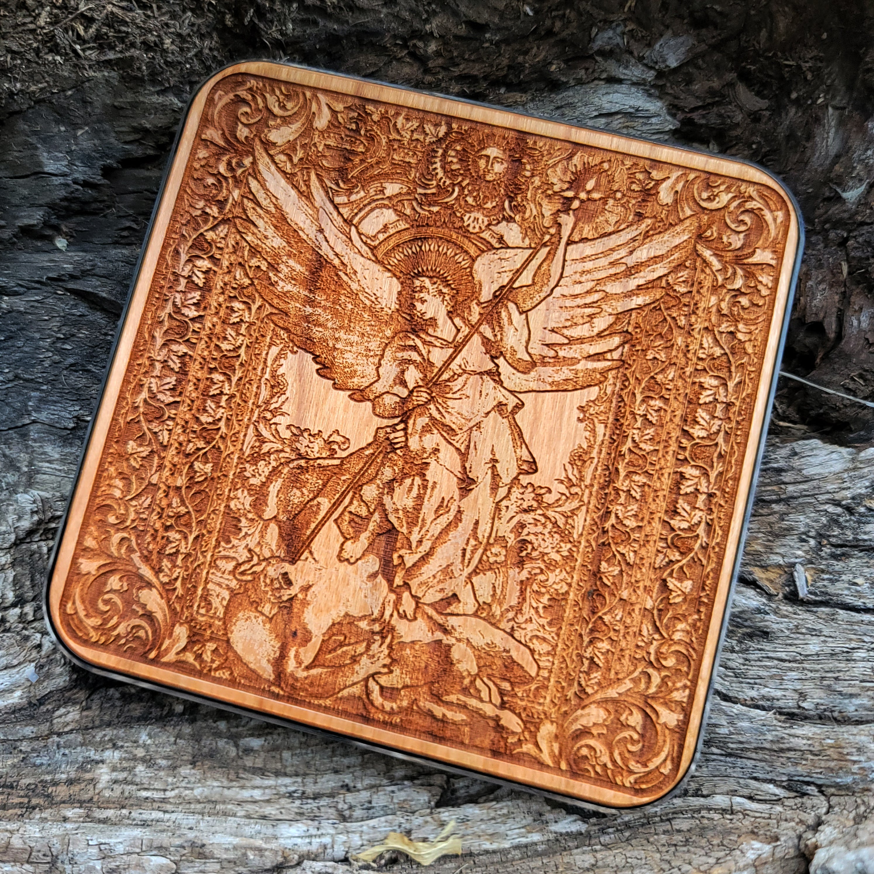 Gothic-style St. Michael wireless charging pad compatible with iPhone 16, Galaxy S25.