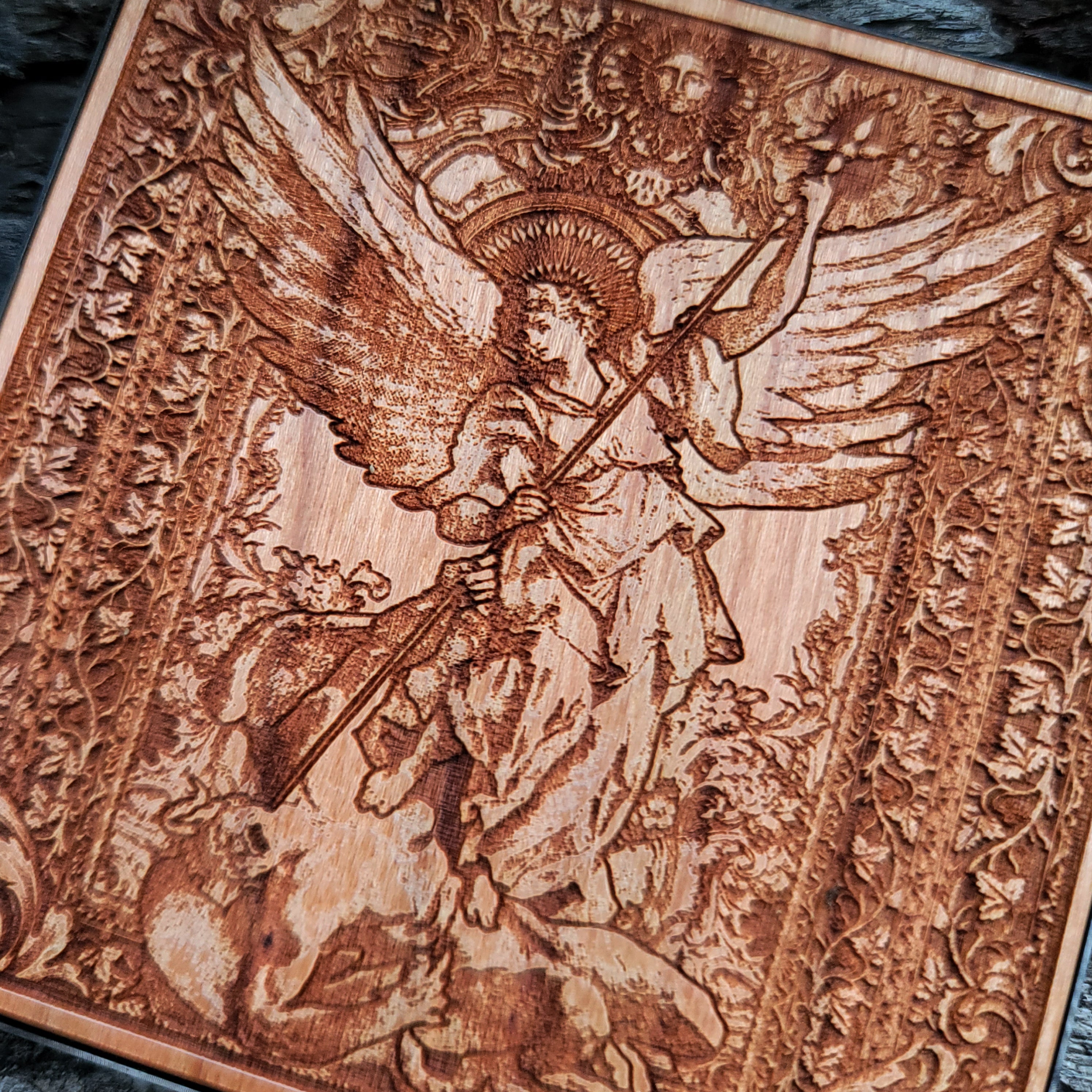 Fast wireless charging pad featuring St. Michael design for Samsung and iPhone.