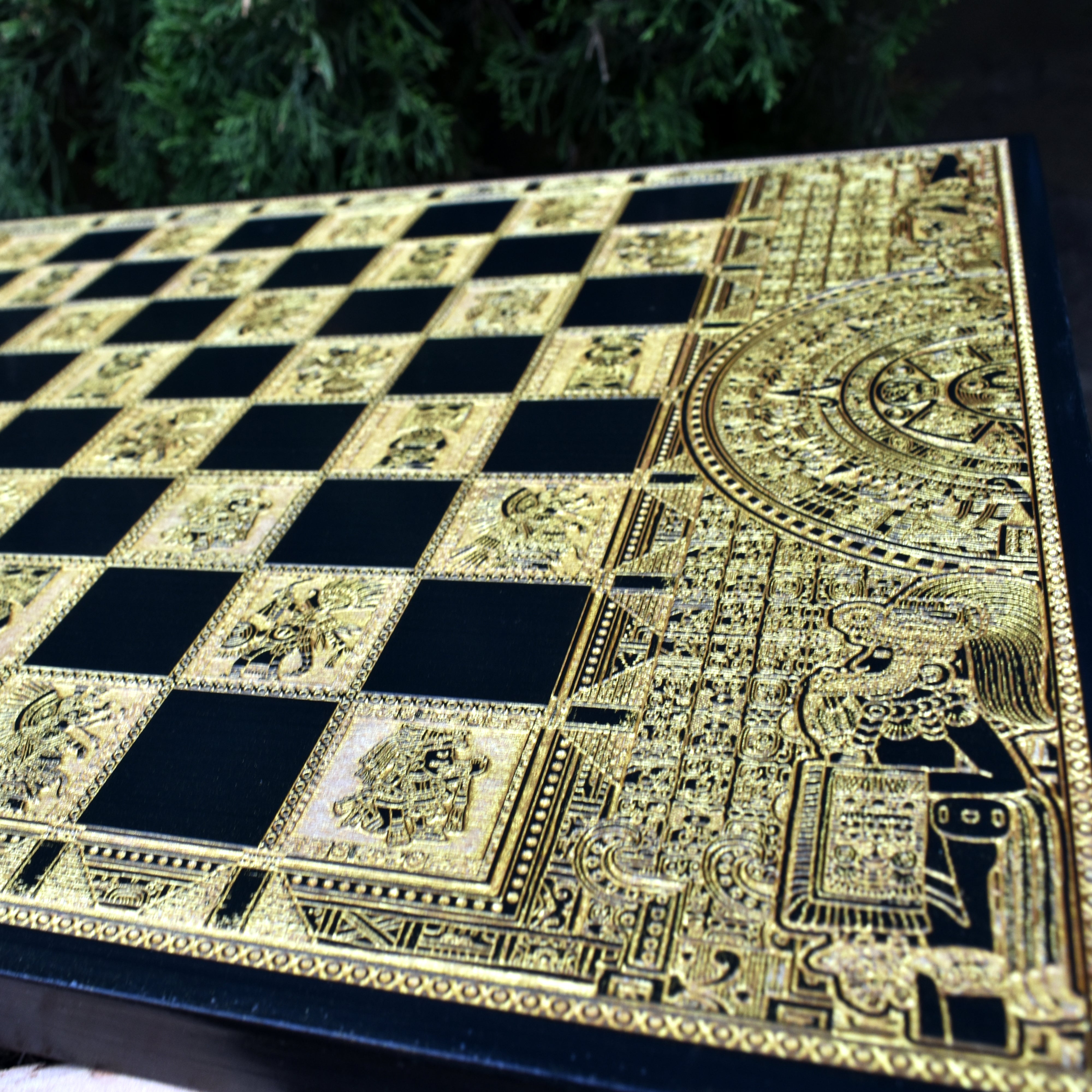 Close-up of premium laser engraving on luxury Aztec chessboard, ideal for anniversaries