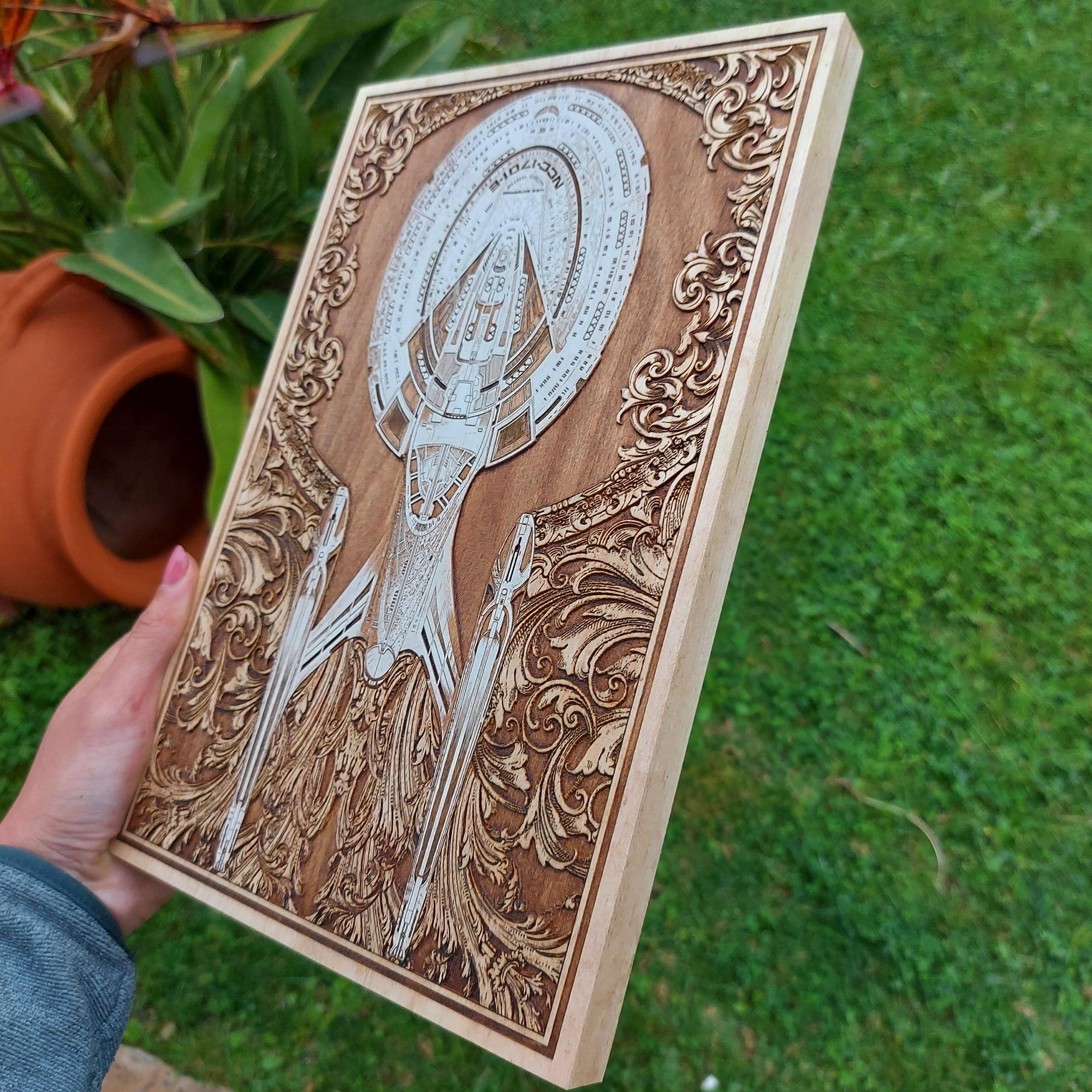 Unique wood art of NCC-1701E with sci-fi anatomical spaceship design.