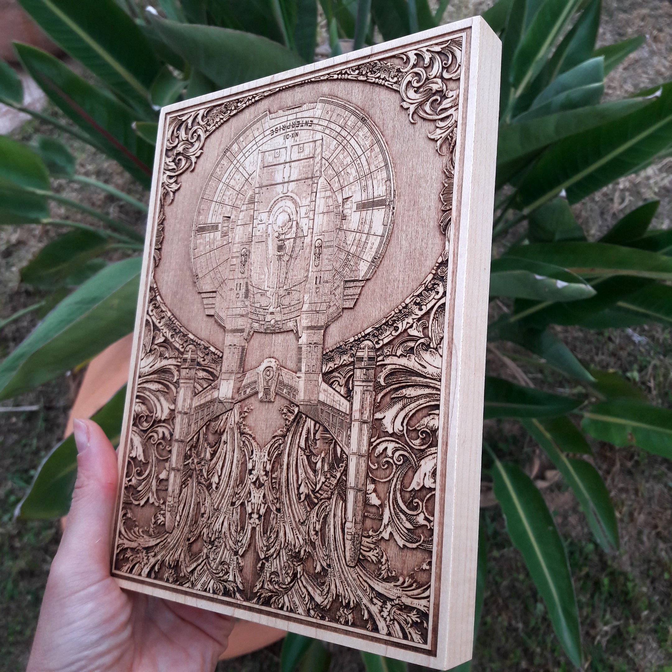 Sci-fi starship wooden plaque, laser-etched with intricate details. Great for geeky home decor.