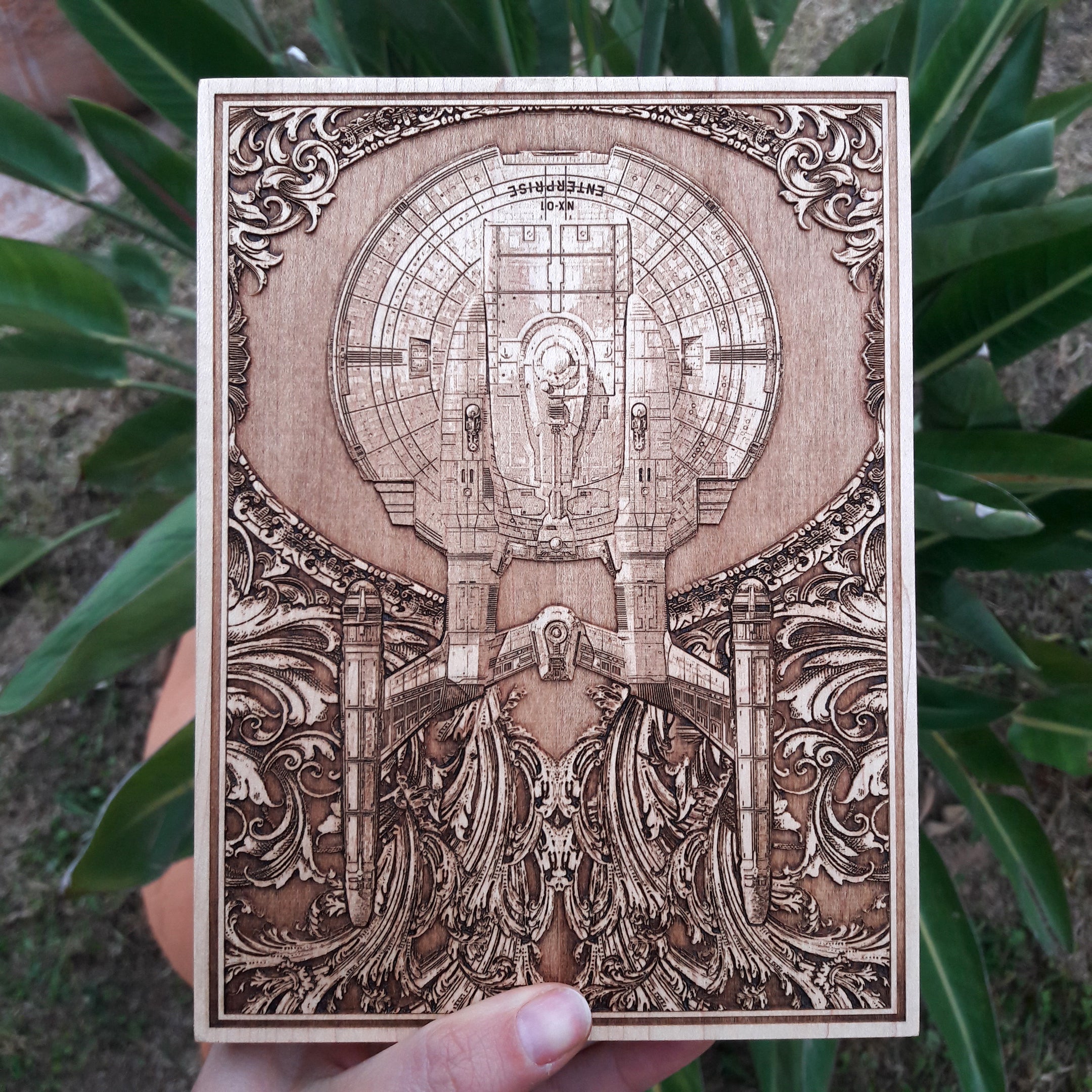 Handmade wooden wall art inspired by the Enterprise starship. A unique sci-fi anniversary gift.
