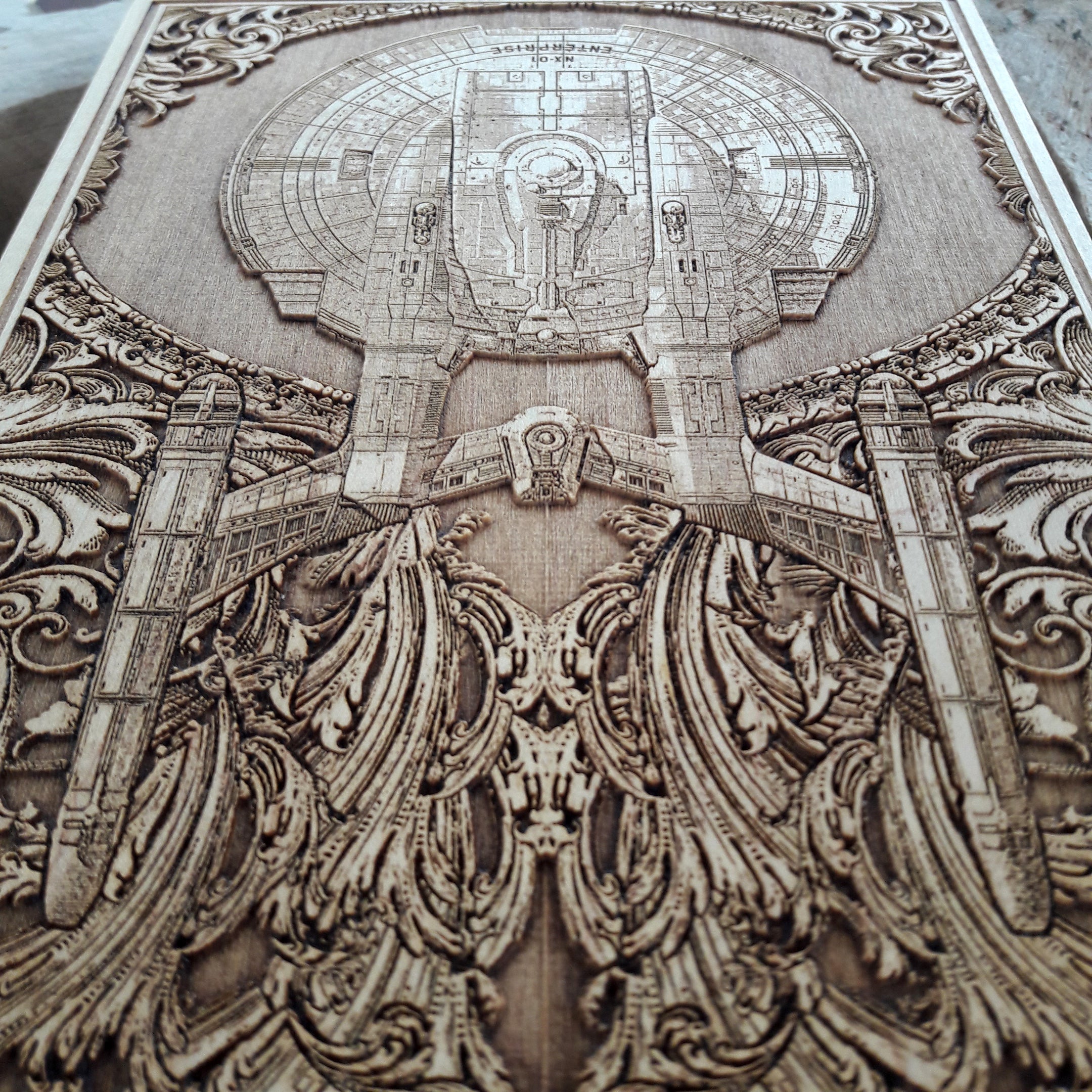 Engraved wooden wall art of a legendary sci-fi spaceship, perfect for space geeks and collectors.