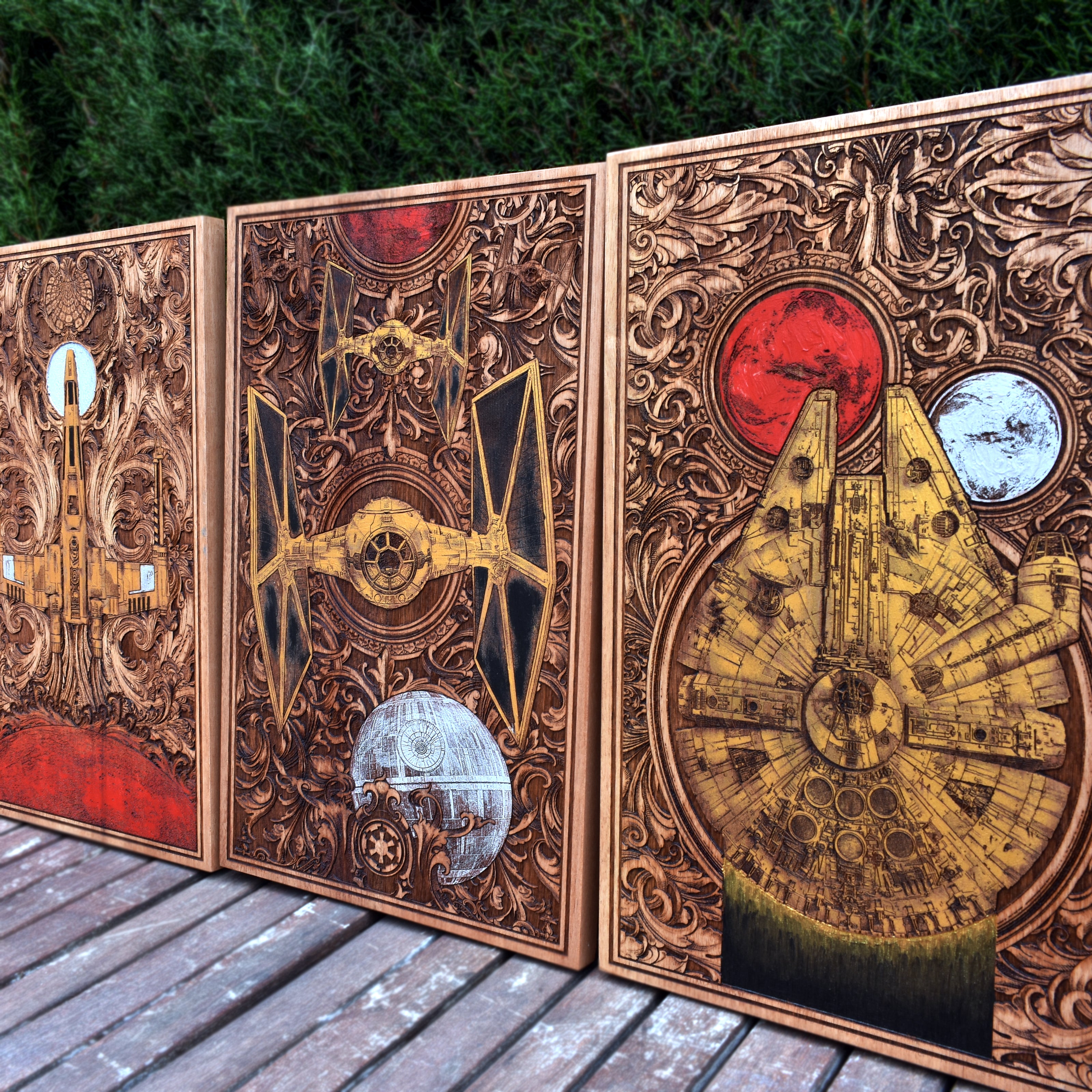 Detailed engraving of a golden TIE Fighter on a custom wood triptych, a stunning collectible for Star Wars fans.