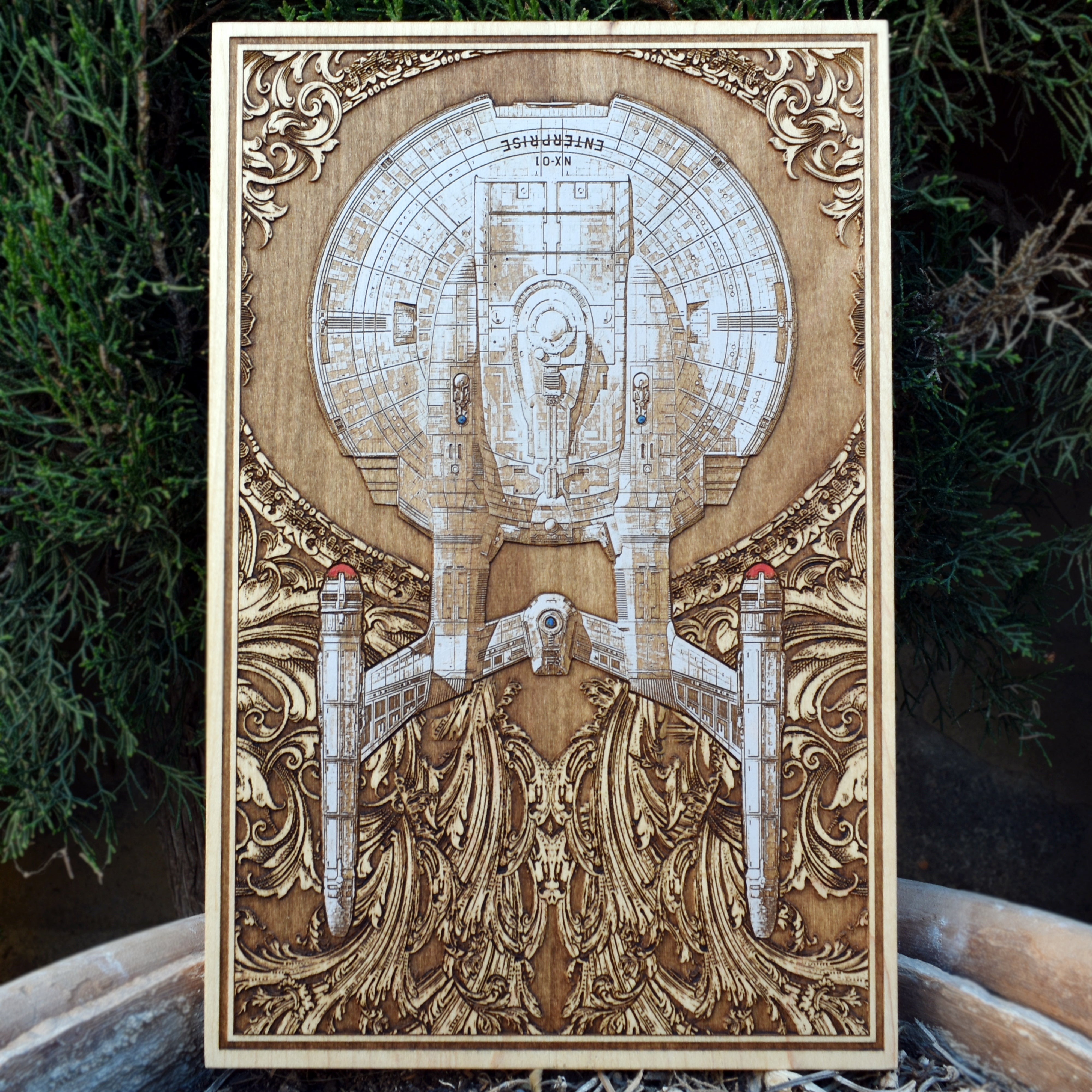 Laser-engraved wood artwork of the NX-01 Enterprise starship from Star Trek.