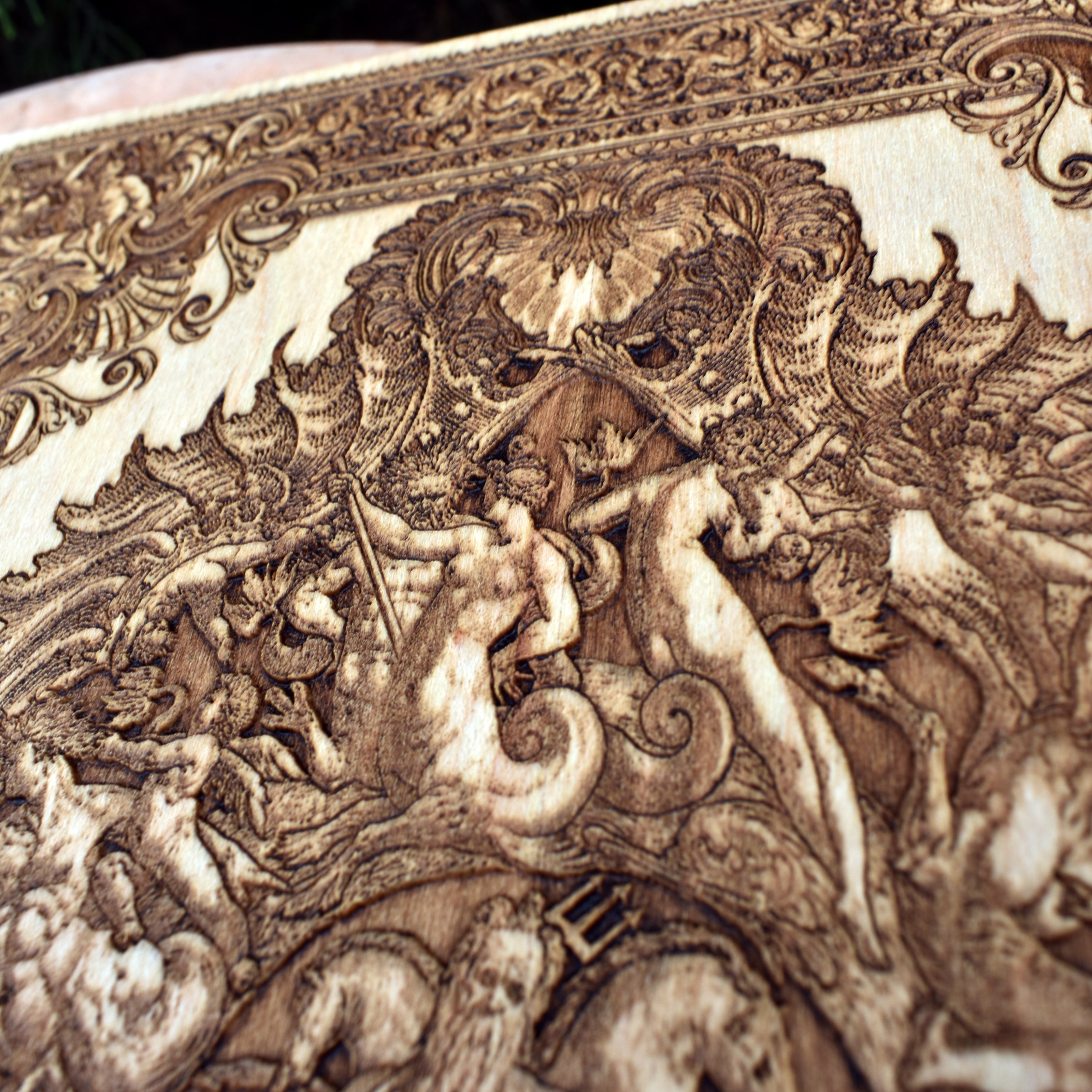 Handmade wooden engraving of Neptune, ocean god artwork, nautical decor piece inspired by mythology and the sea.
