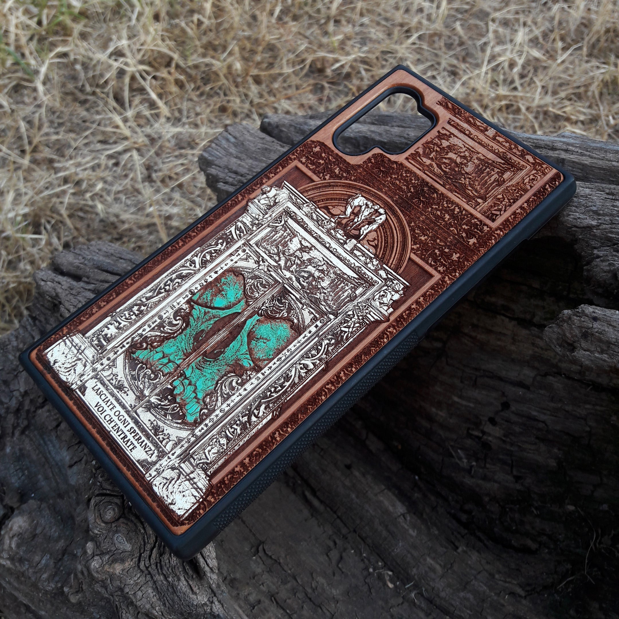 Hand-painted and laser-engraved "Hell Gate II" wooden phone case depicting a demonic skull on cherrywood. Compatible with iPhone -11 Pro Max and Galaxy S-S20 models.