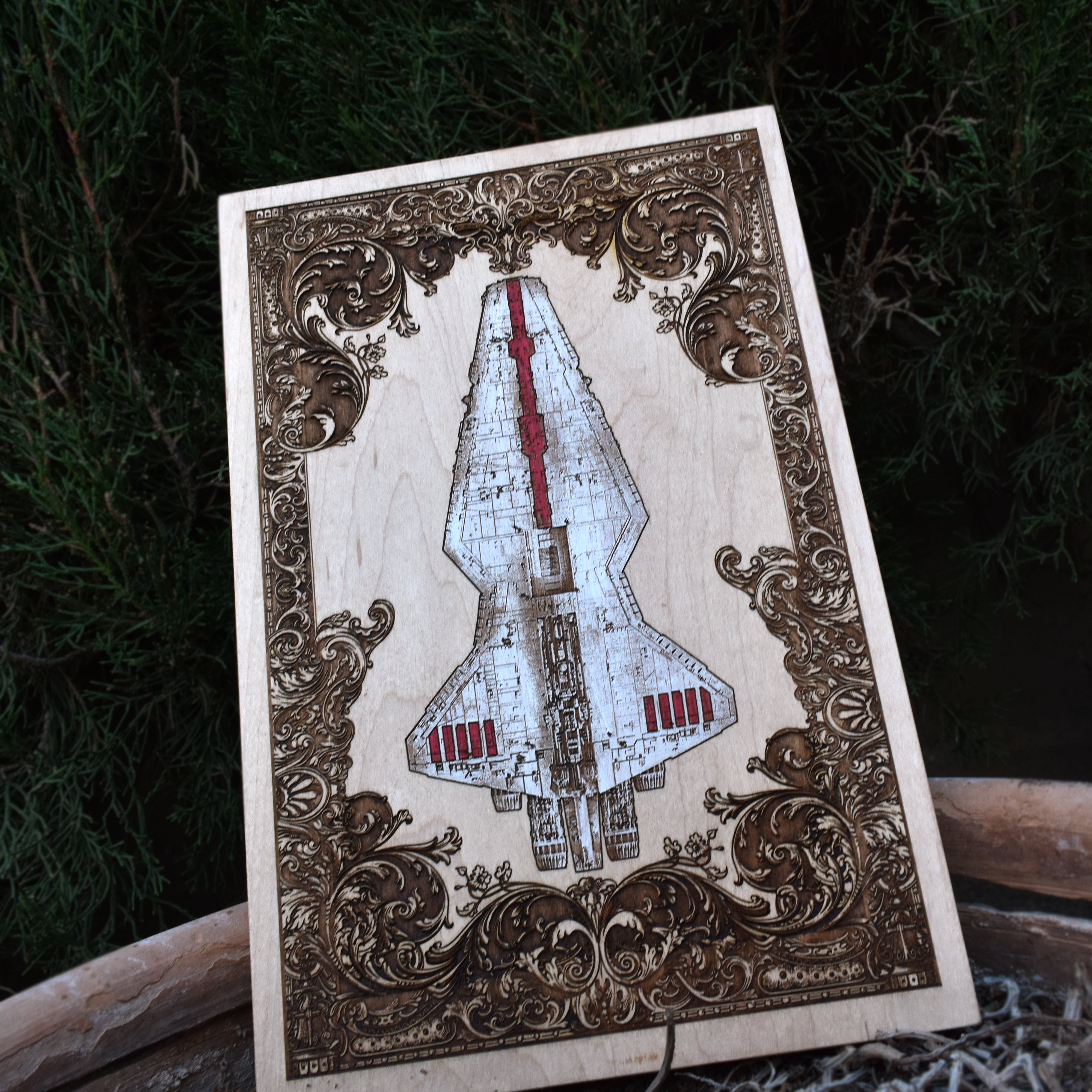 Handmade wood wall art featuring a laser-engraved sci-fi starship design.