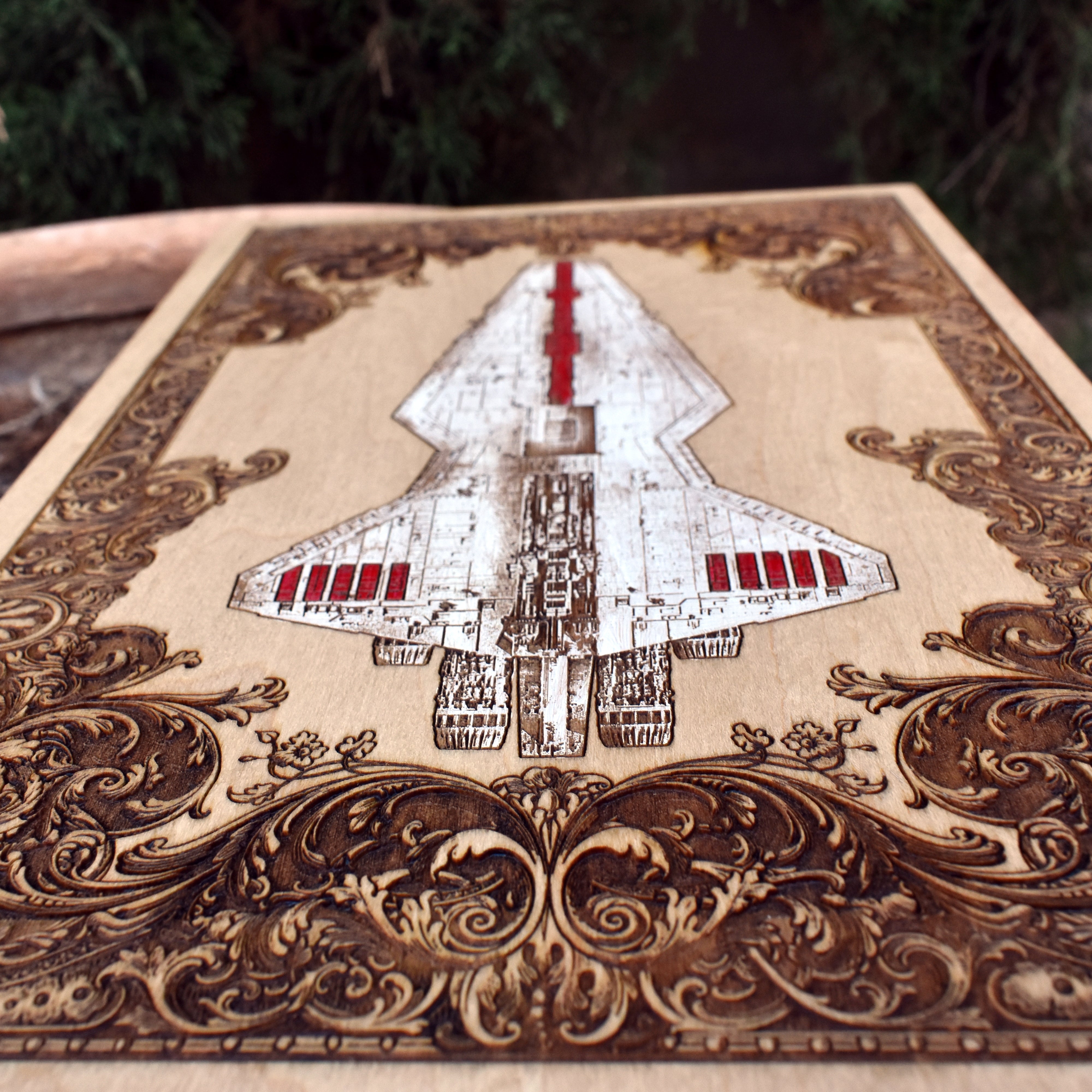 Laser-etched starship wood artwork for Star Wars-themed room decoration.