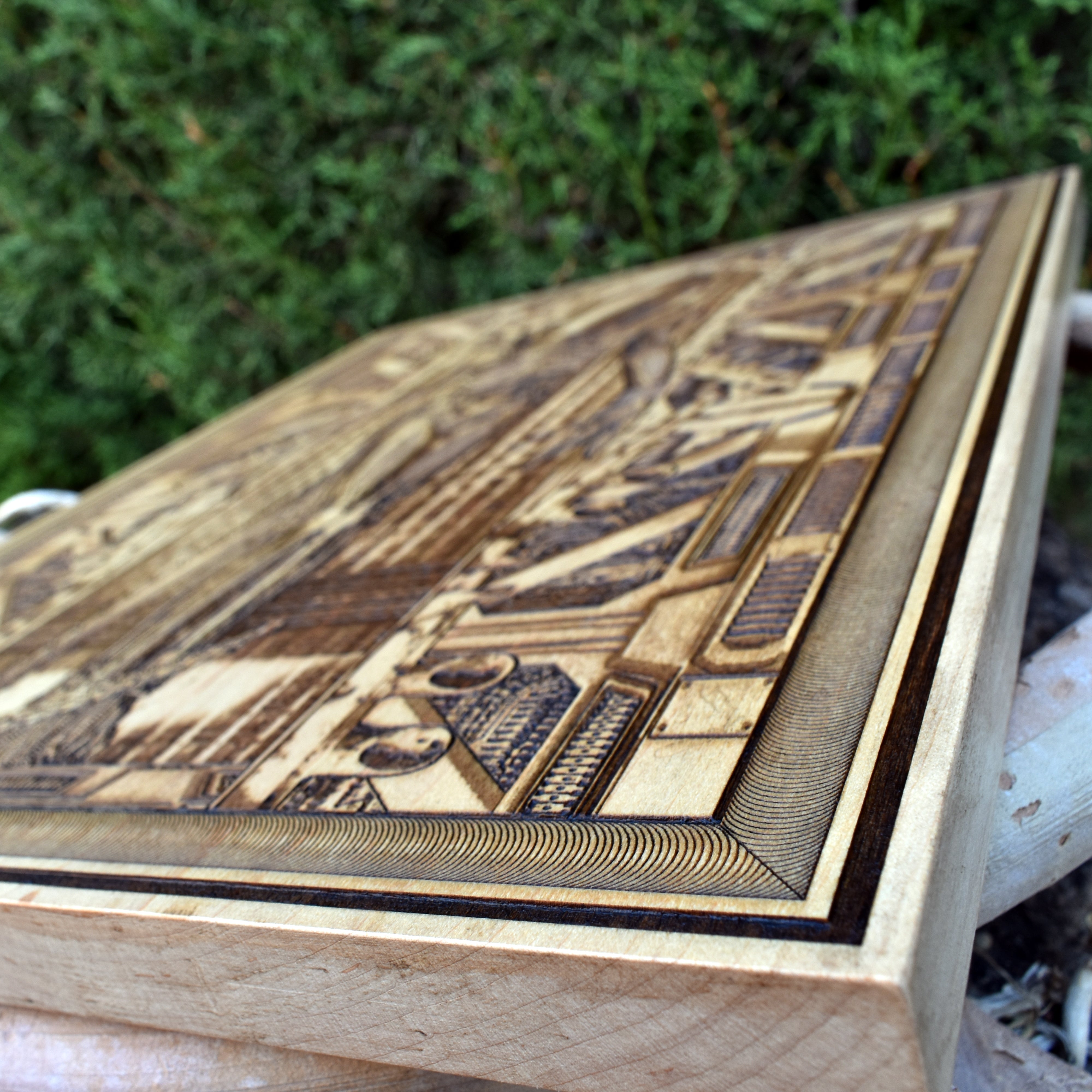 Sci-fi wooden art plaque with engraved Alien creature