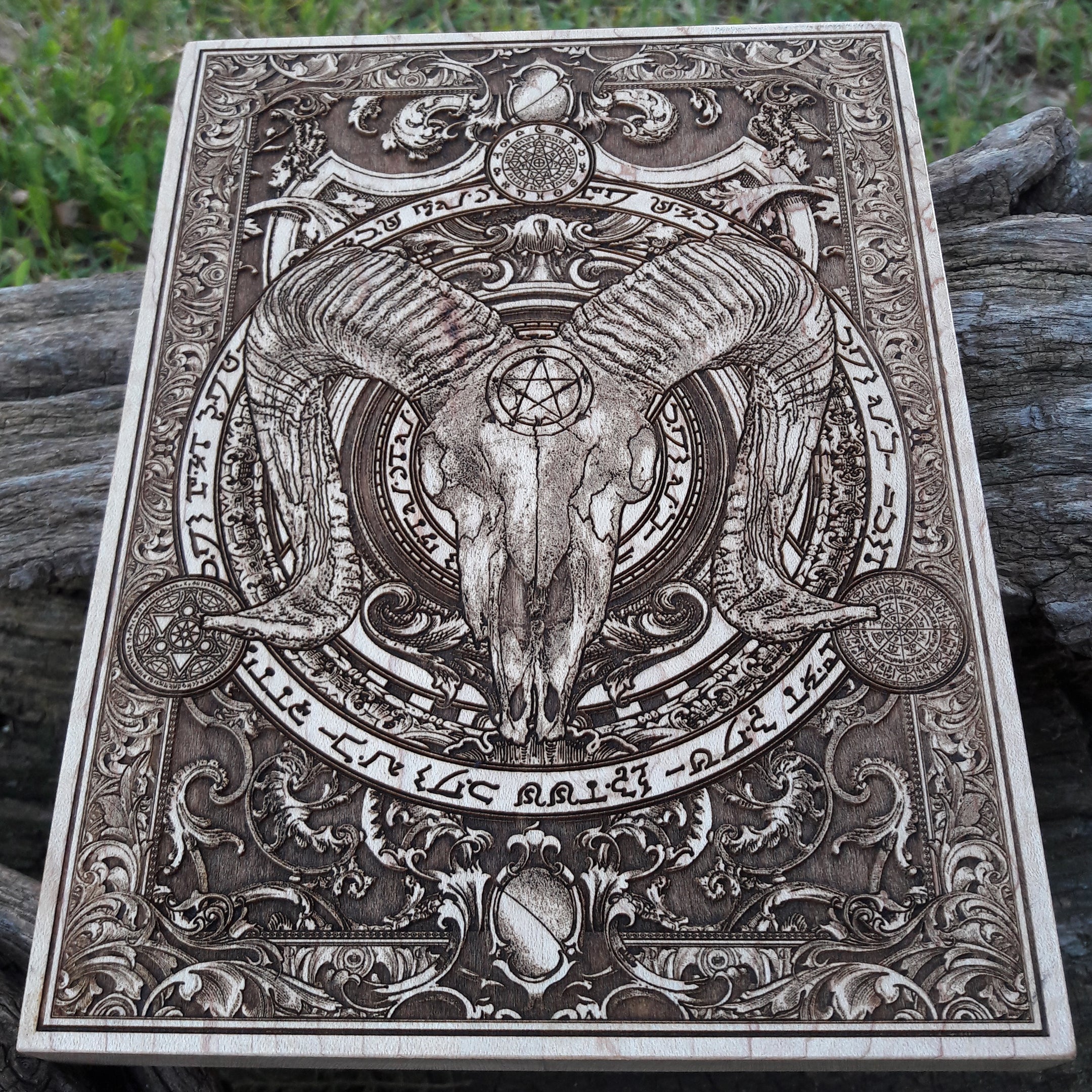 Witchcraft and occult-themed ram skull wood art, perfect for alternative wall decor.