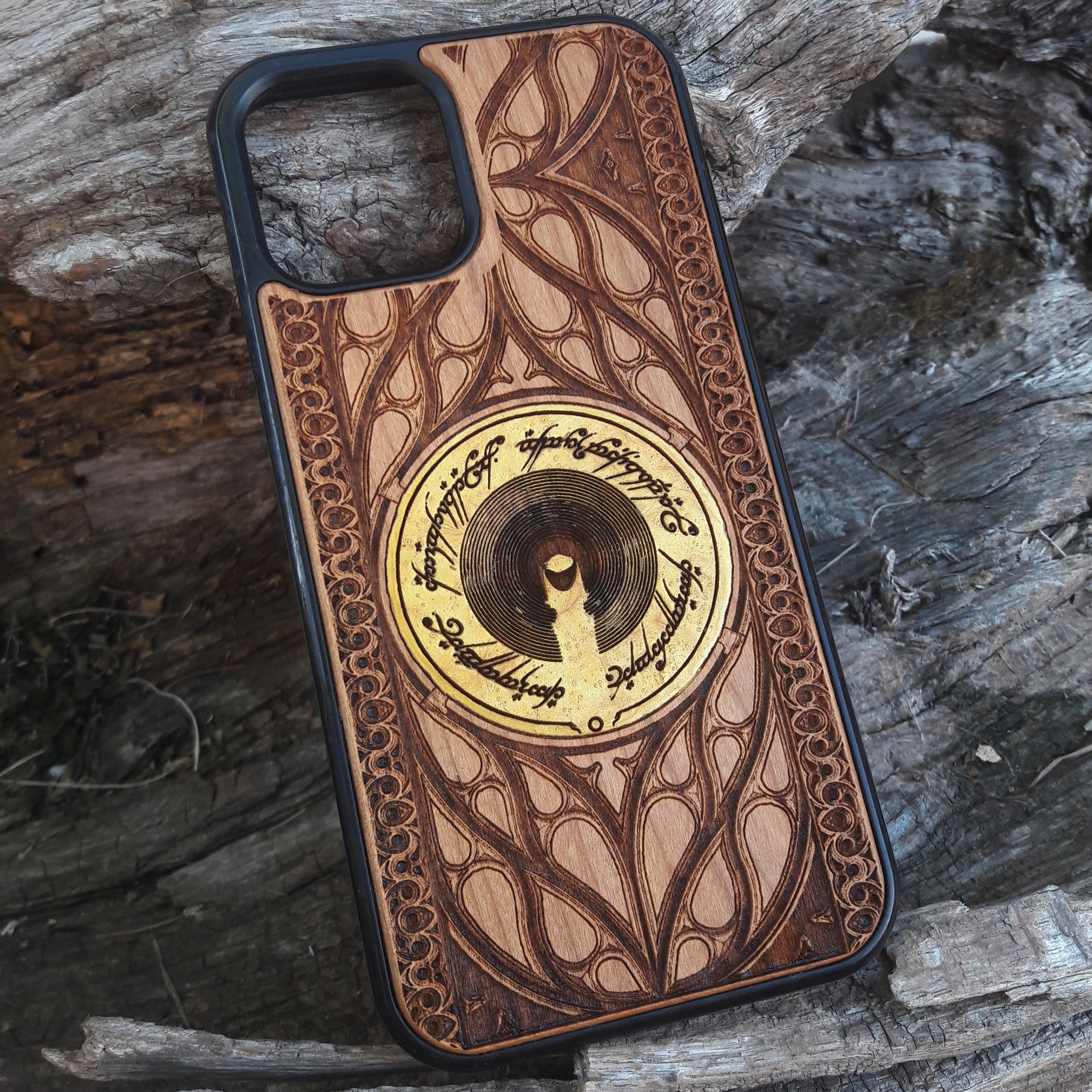 Wooden phone case for iPhone & Samsung Galaxy featuring The Dark Tower design from Lord of the Rings. Laser-engraved with intricate details for a unique look. Compatible with iPhone , 15, 14, 13, 12, 11 Pro Max Mini & Samsung Galaxy S, S24, S23, S22, S21, S20 Ultra Plus Note 20. Durable, slim, and stylish. Perfect for Lord of the Rings fans. Order now!