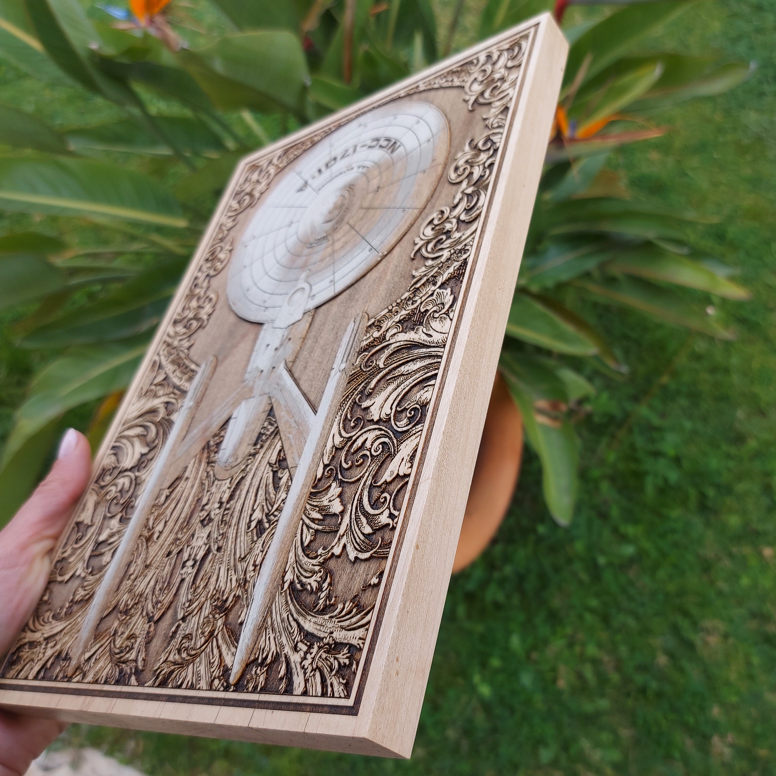 Detailed Star Trek Enterprise artwork, engraved and painted on maple wood.