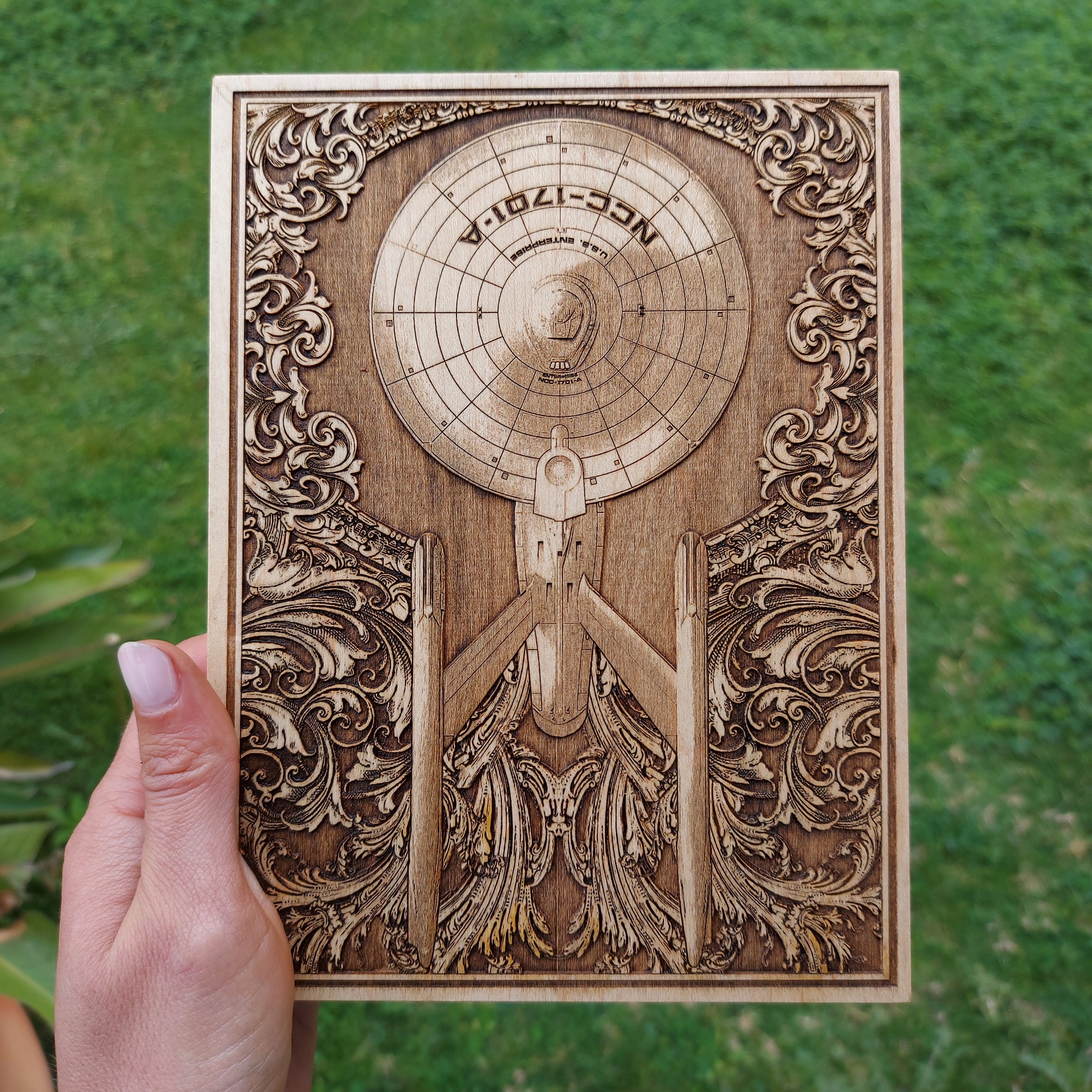 Laser-engraved sci-fi wall art – wood art of a Starship Enterprise.