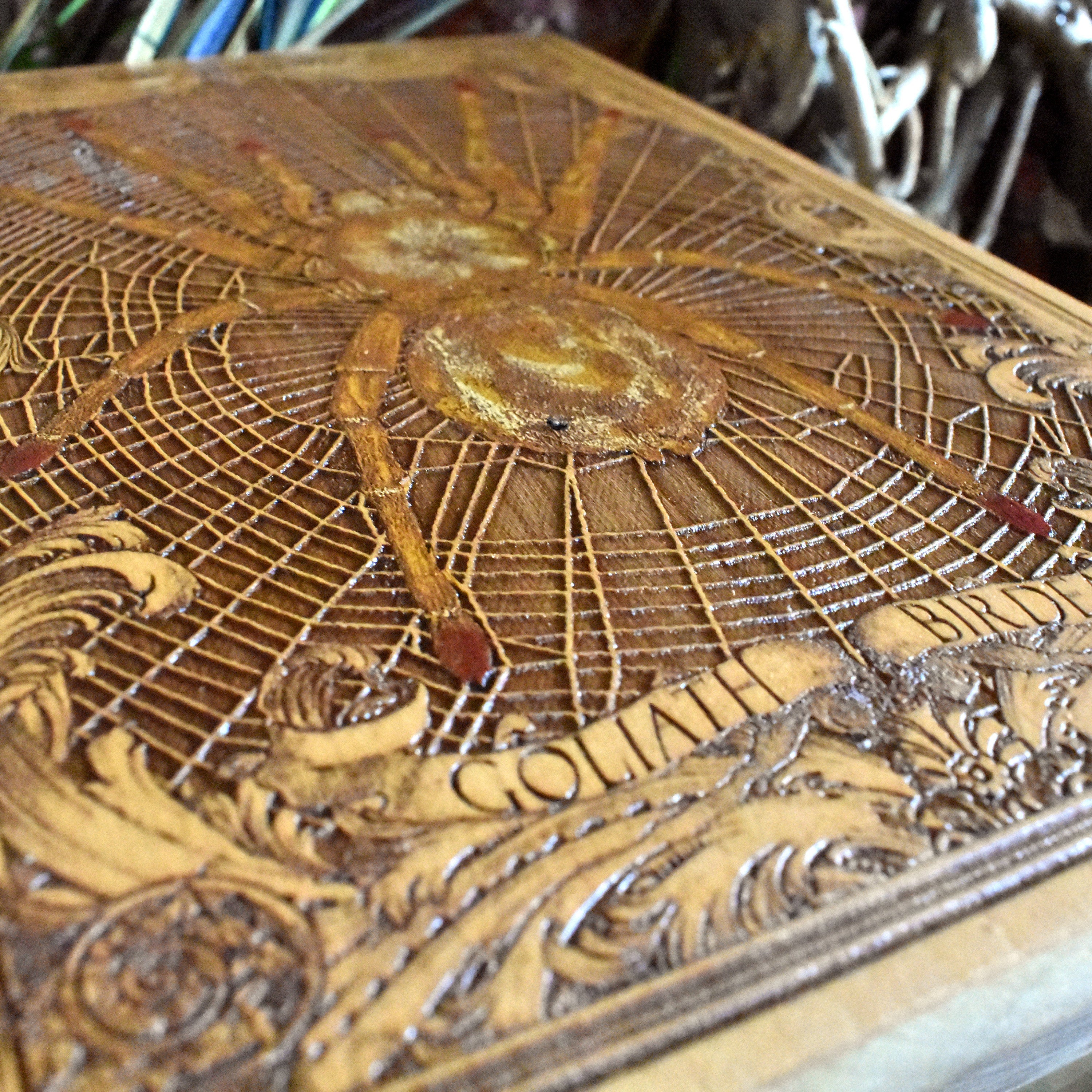 Hyper-detailed spider wall art, featuring the Goliath Birdeater in wood.