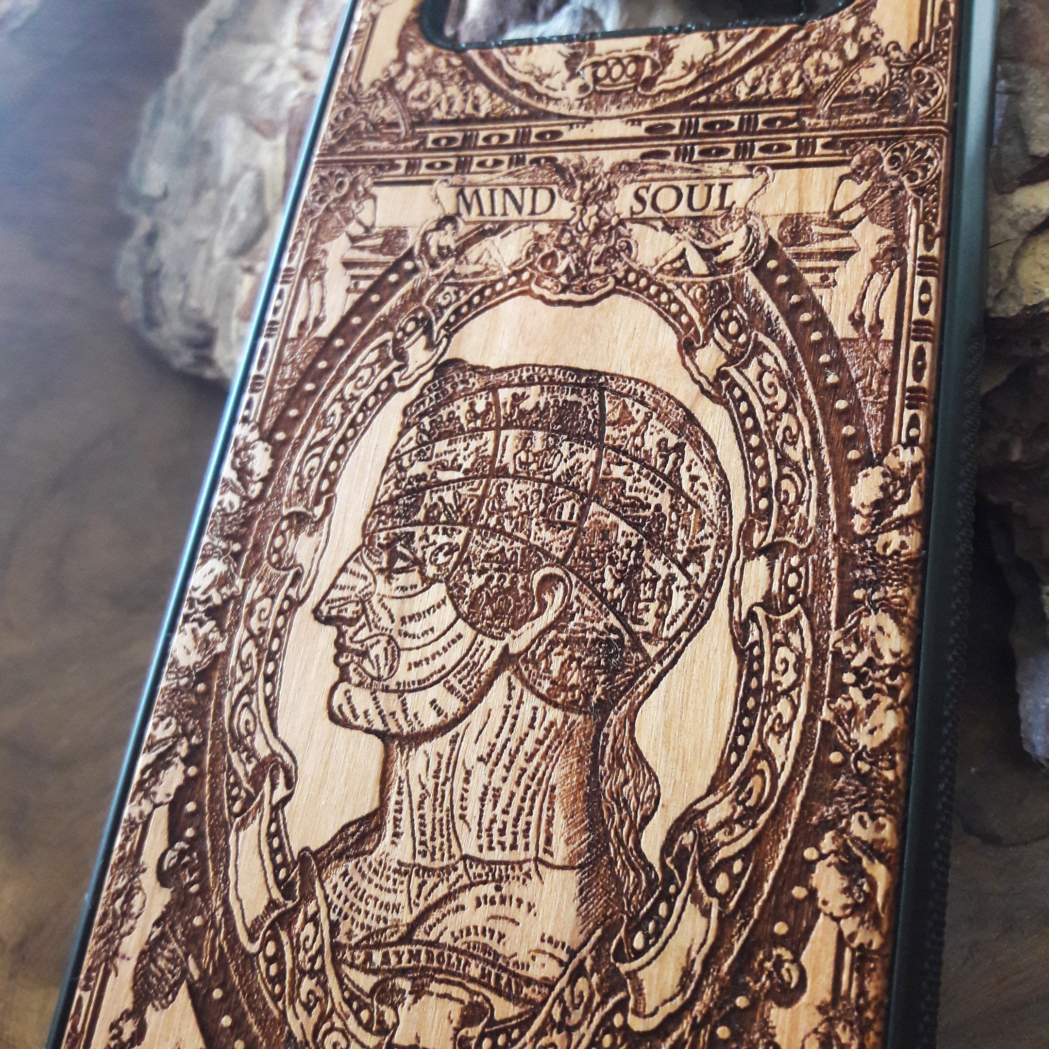 Wooden phone case with gothic skull and skeleton design, handcrafted for iPhone , iPhone 15, Samsung Galaxy S, and more. Unique, durable, and perfect for fans of gothic and dark fantasy art.