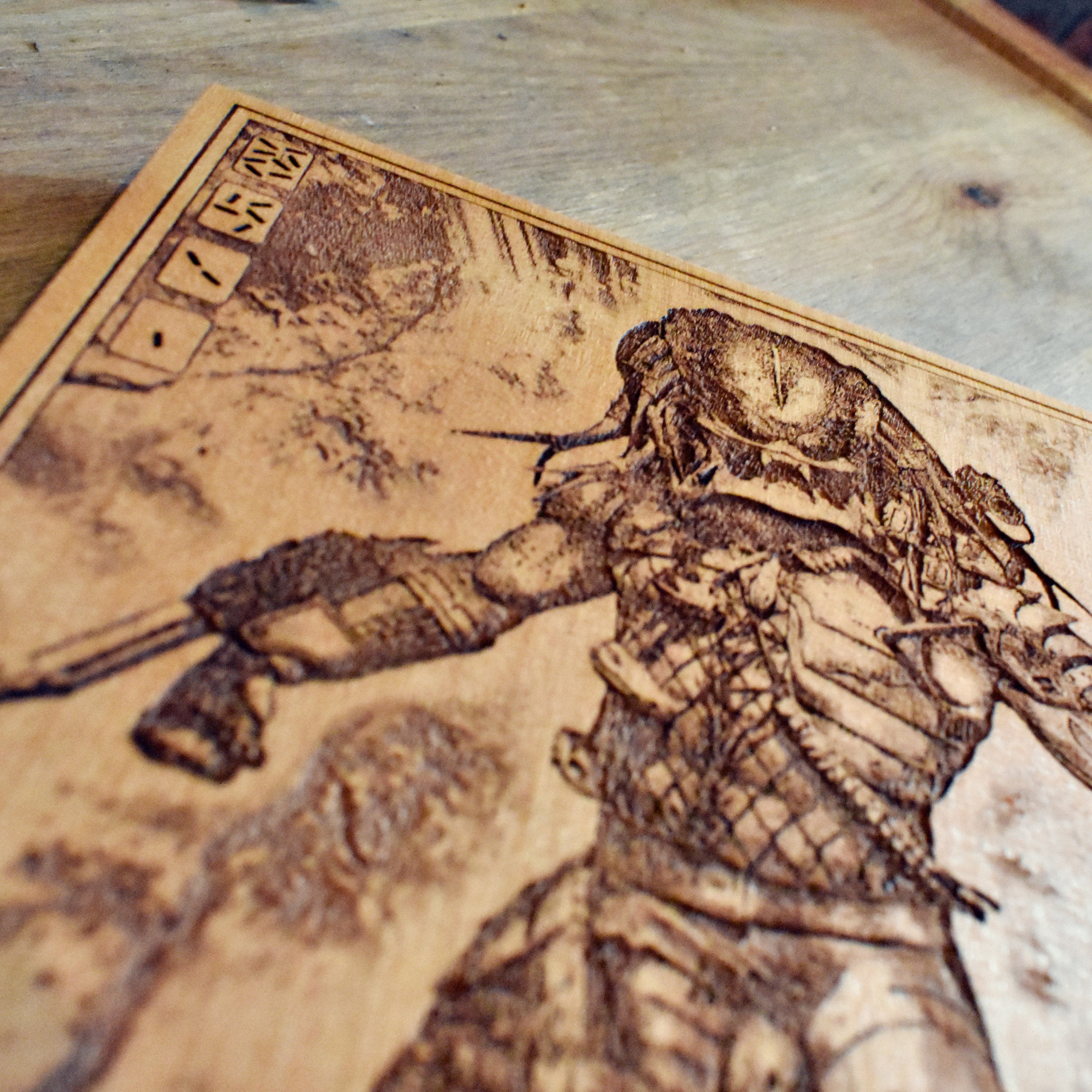 Wooden Predator engraving, high-detail laser-etched sci-fi artwork, great for horror enthusiasts.