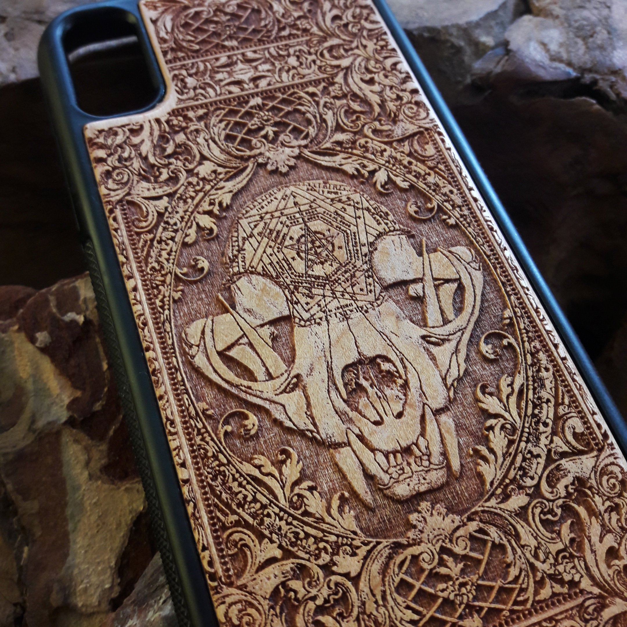 Wooden phone case with an evil cat skull design, intricately carved for iPhone , iPhone 15, Galaxy S, Note 20, and more. Perfect for fans of gothic and dark-themed accessories.