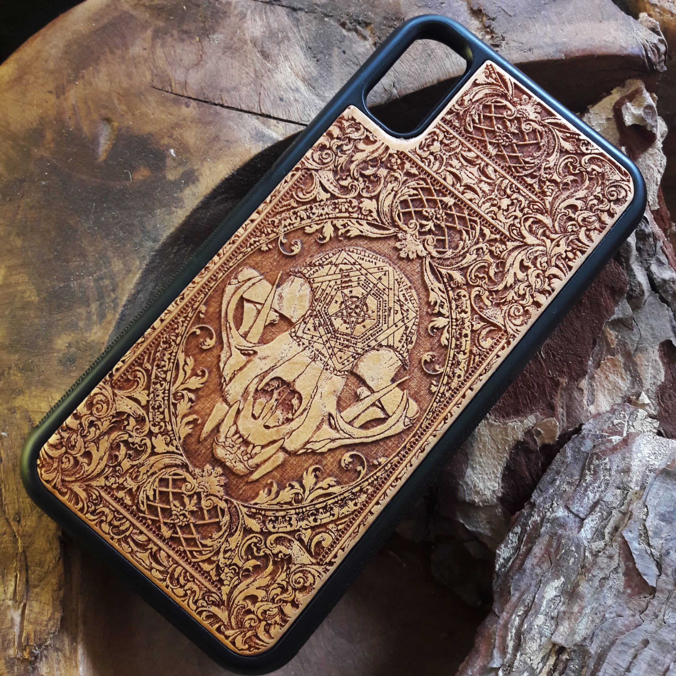 Wooden phone case with an evil cat skull design, intricately carved for iPhone , iPhone 15, Galaxy S, Note 20, and more. Perfect for fans of gothic and dark-themed accessories.