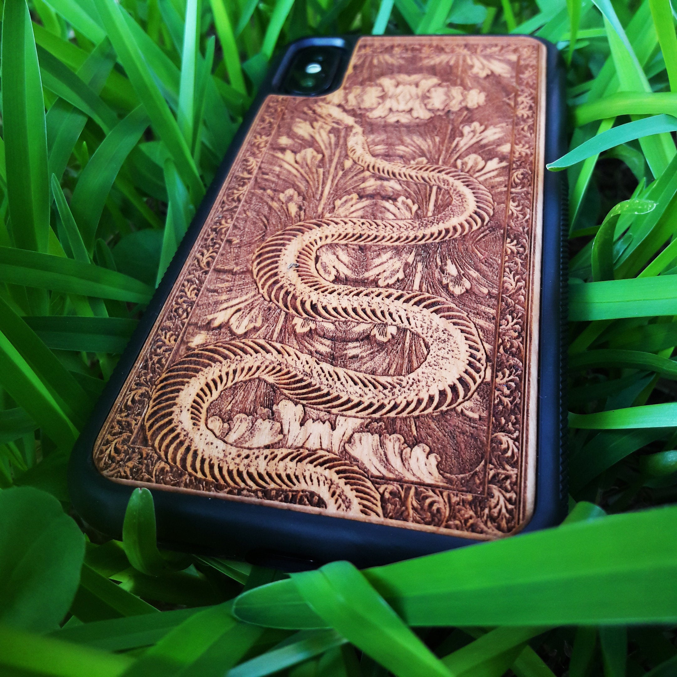 Snake Design Wooden Phone Case for iPhone & Samsung Galaxy - Laser Engraved Gothic Art - iPhone , S Compatible.
This ensures the listing is attractive to both search engines and potential customers by focusing on key features like the snake design, wood material, and model compatibility while optimizing for relevant search terms.