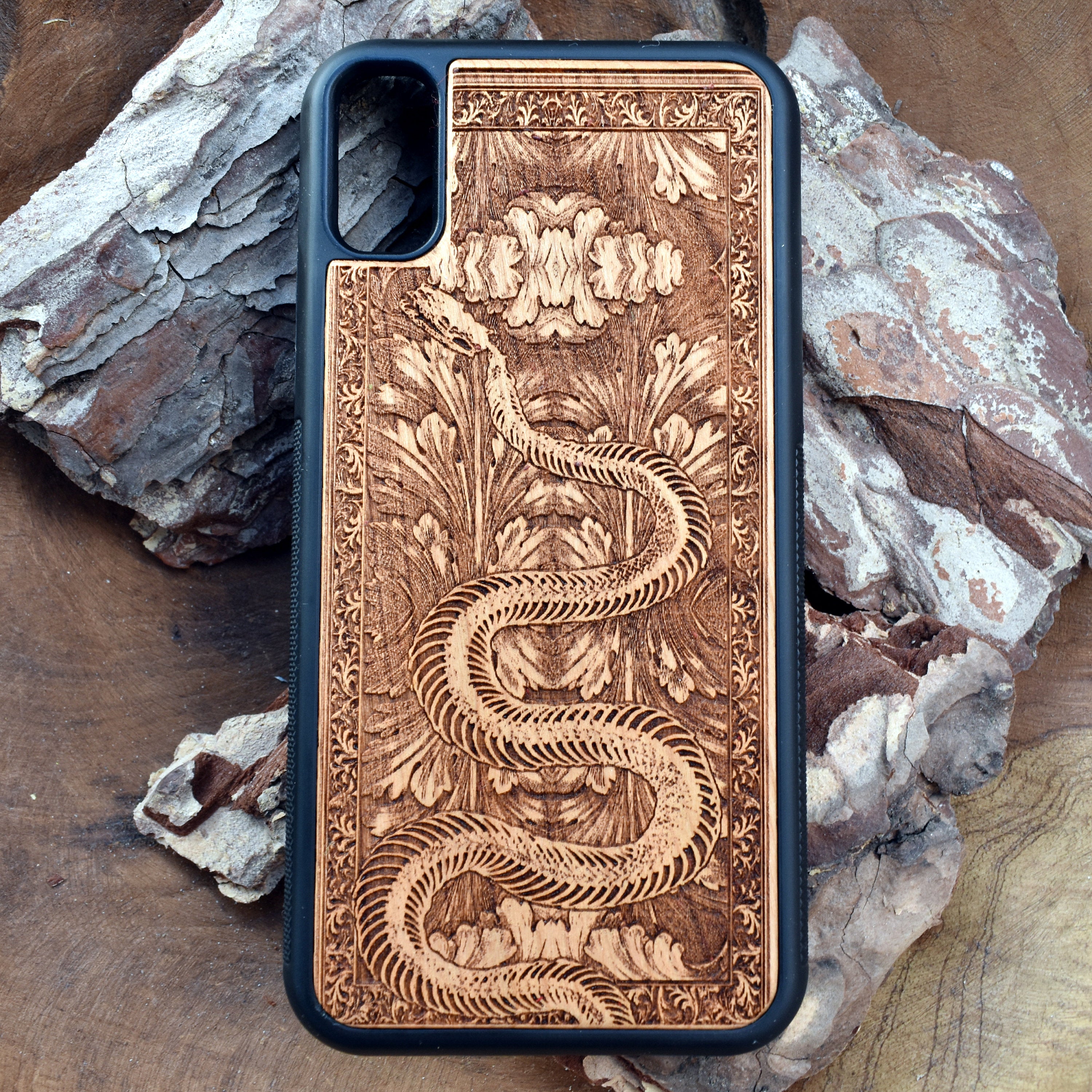 Snake Design Wooden Phone Case for iPhone & Samsung Galaxy - Laser Engraved Gothic Art - iPhone , S Compatible.
This ensures the listing is attractive to both search engines and potential customers by focusing on key features like the snake design, wood material, and model compatibility while optimizing for relevant search terms.
